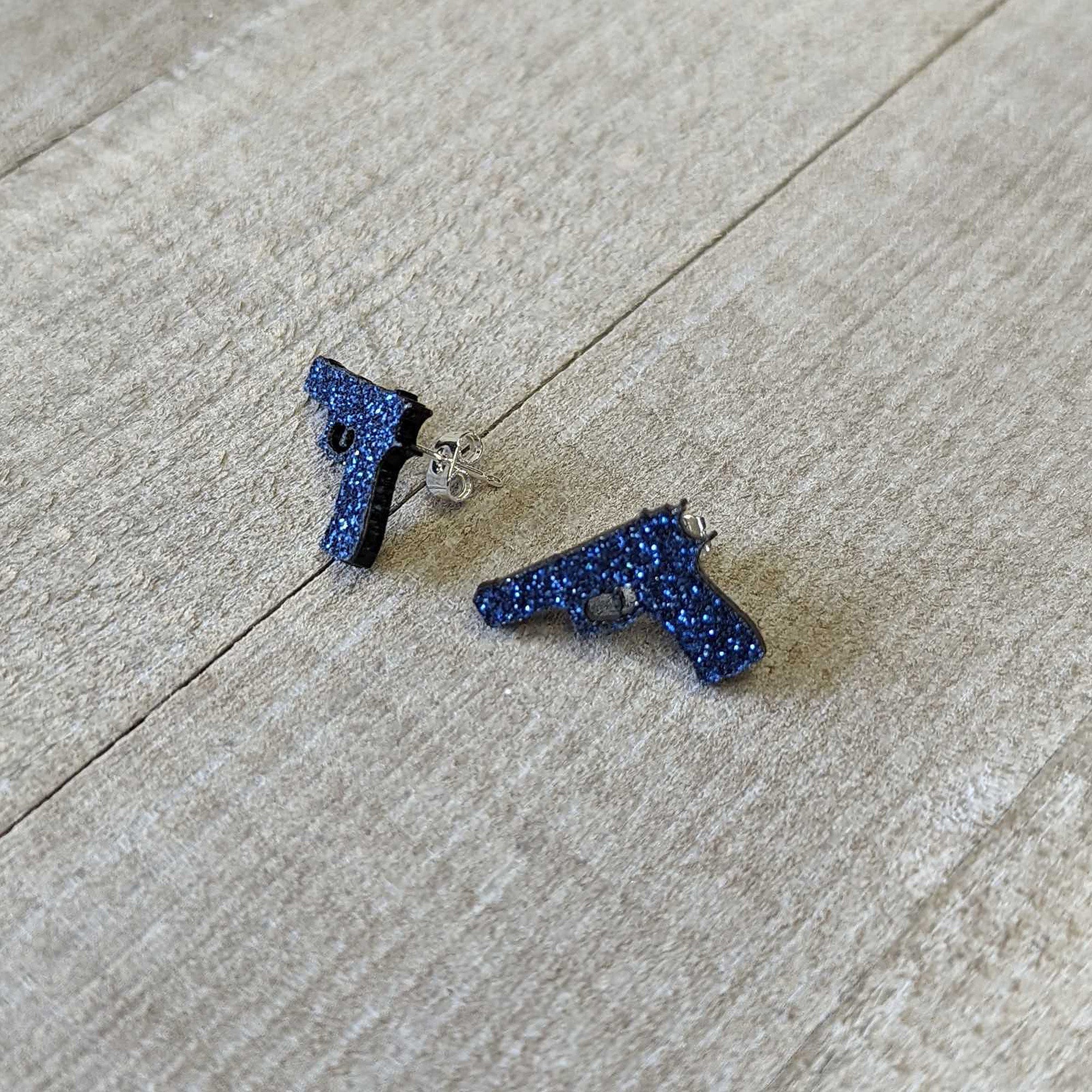 BodyCandy Blue Glitter Gun Stud Earrings Set — lifestyle context