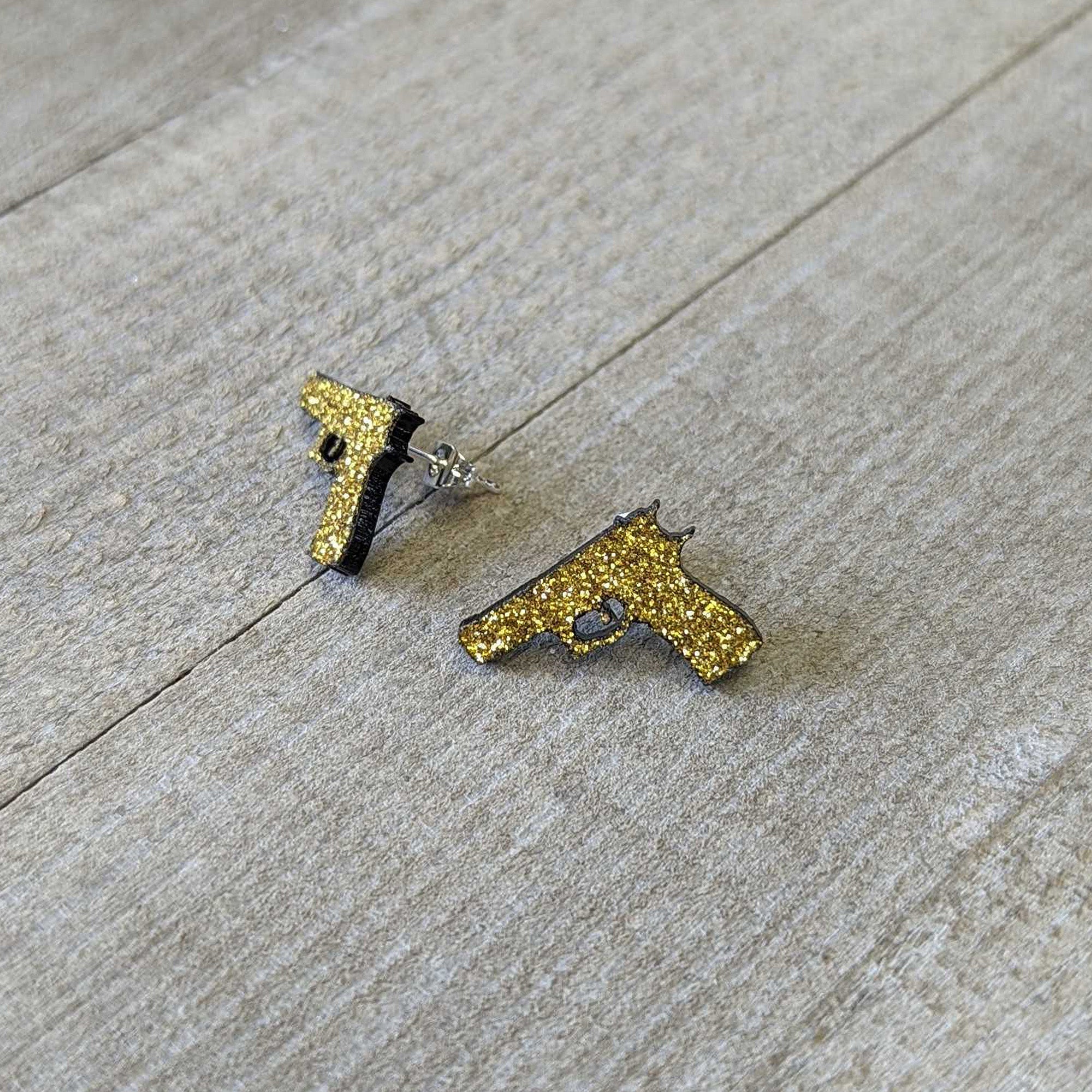 BodyCandy Yellow Glitter Gun Stud Earrings Set — lifestyle context