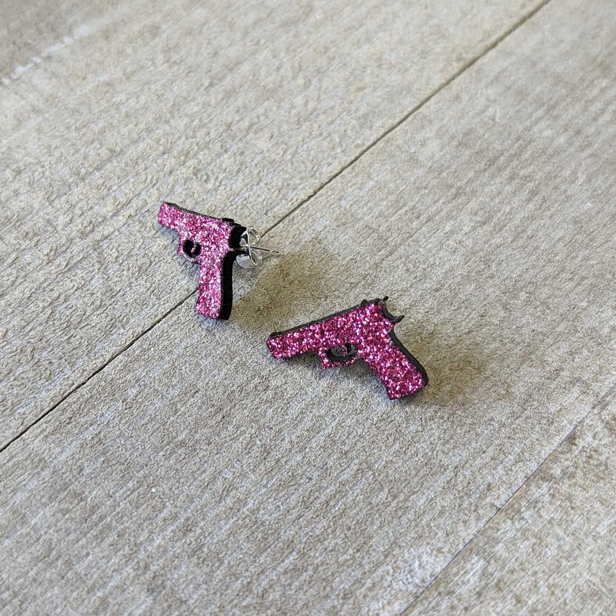 BodyCandy Pink Glitter Gun Stud Earrings Set — lifestyle context