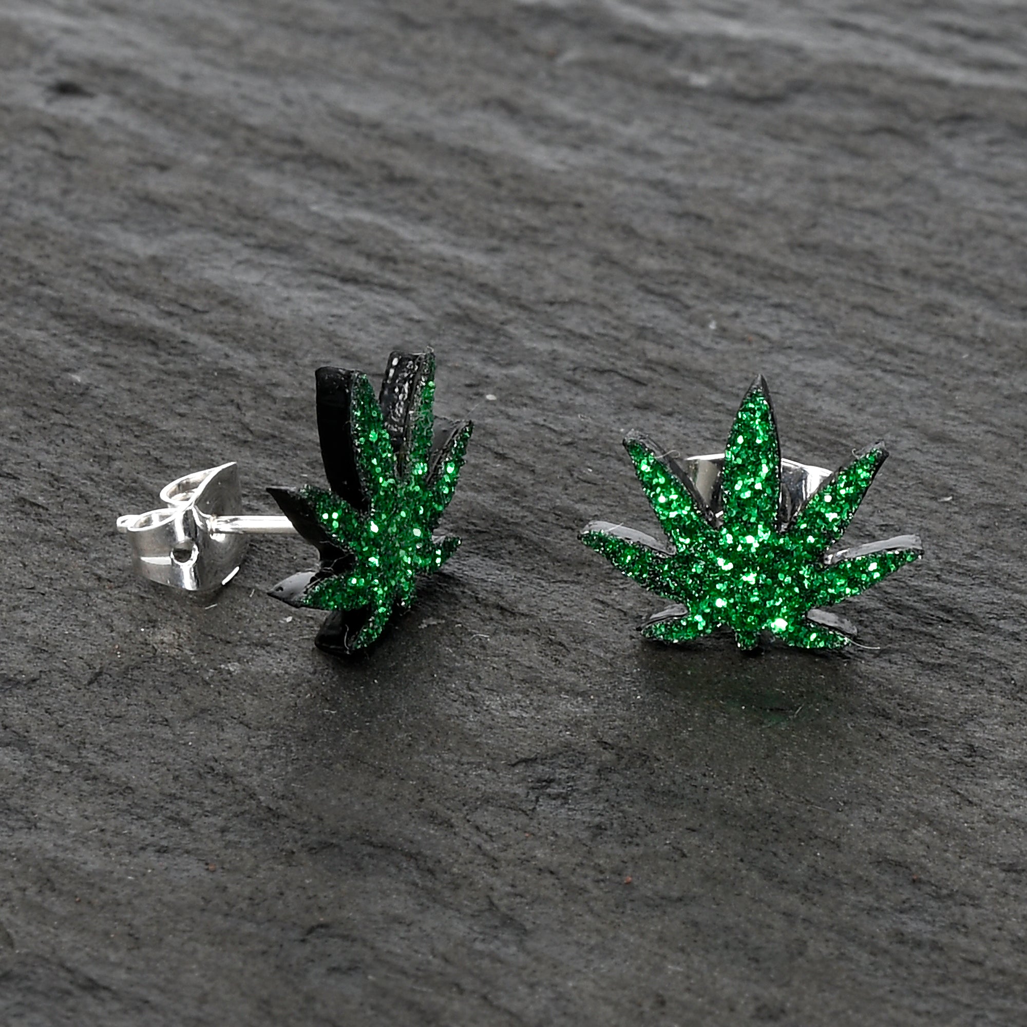 BodyCandy Green Glitter Marijuana Pot Leaf Stud Earrings — back view