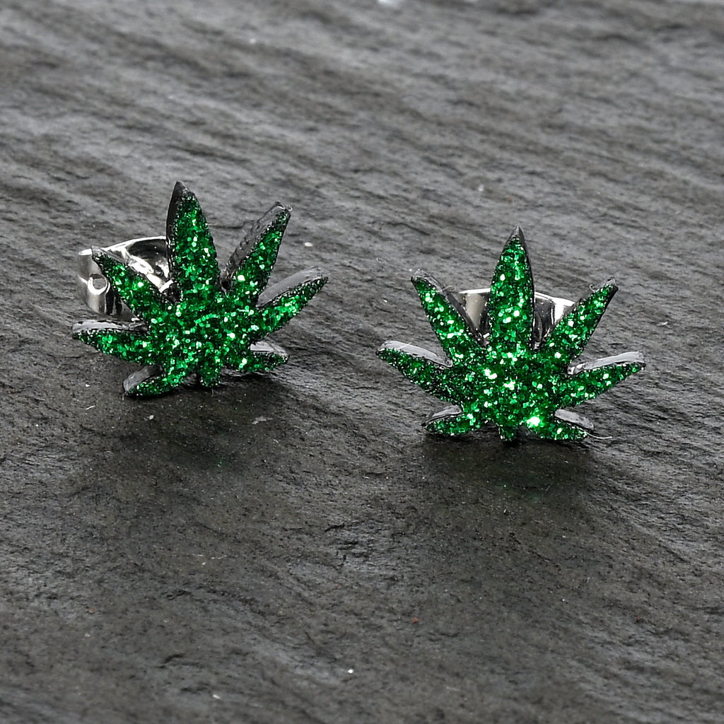 BodyCandy Green Glitter Marijuana Pot Leaf Stud Earrings — in-use photo