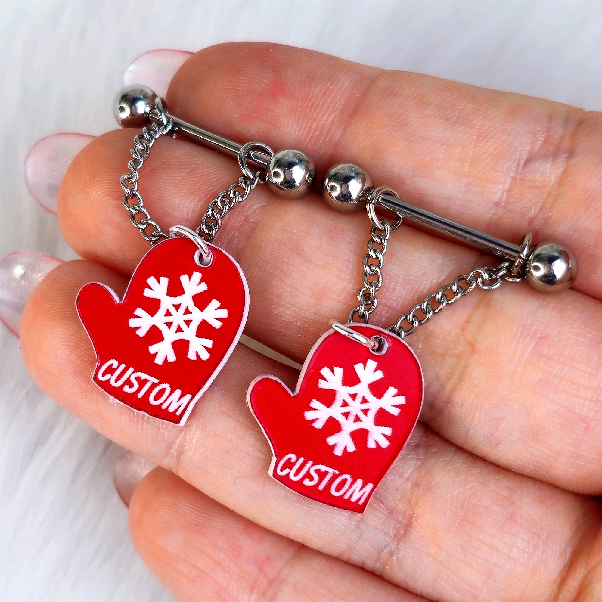 BodyCandy Custom Holiday Mittens Personalized Dangle Barbell Nipple Ring Set — detail close-up