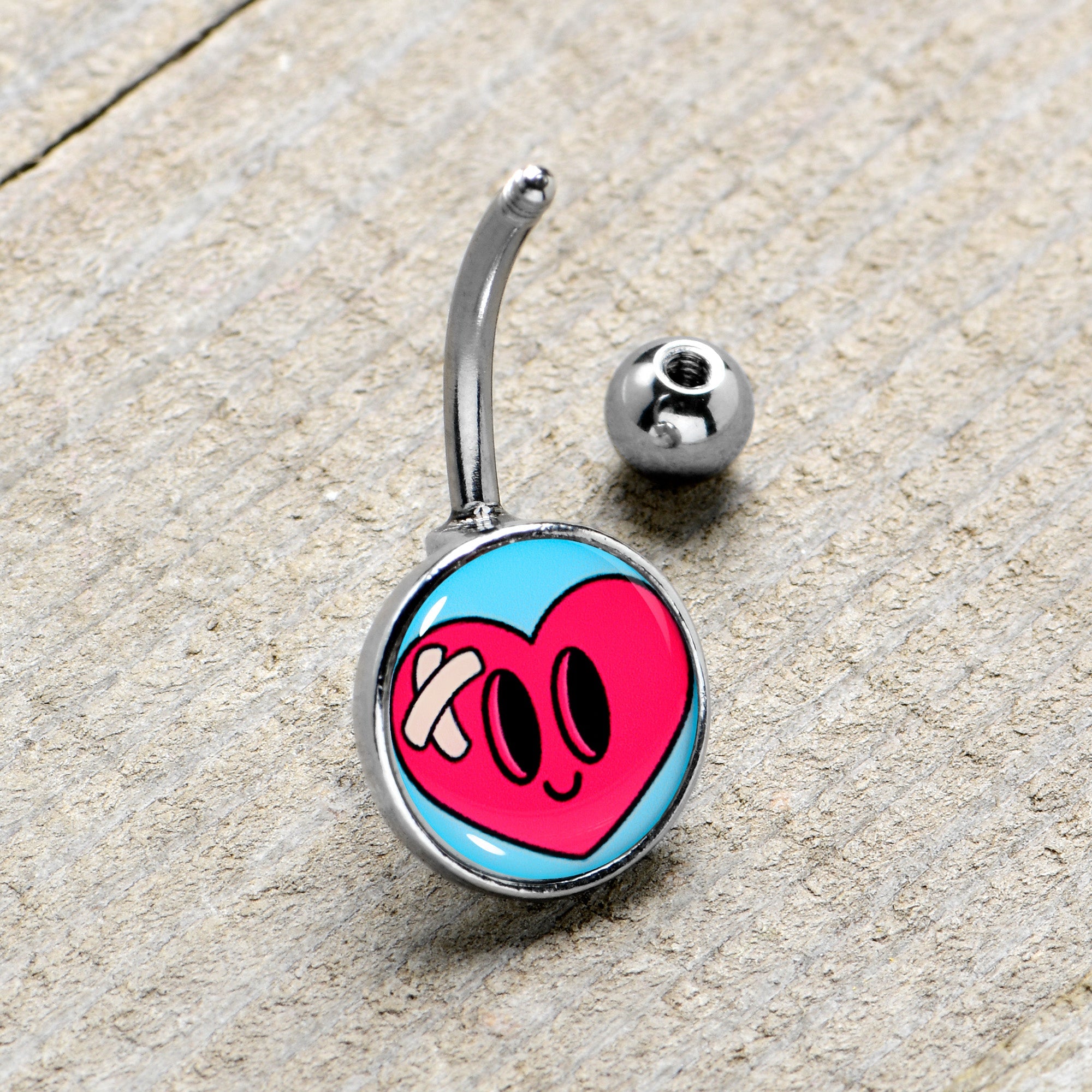 BodyCandy Bandaged Heartbreak Heart Belly Ring by Onyx O — lifestyle context