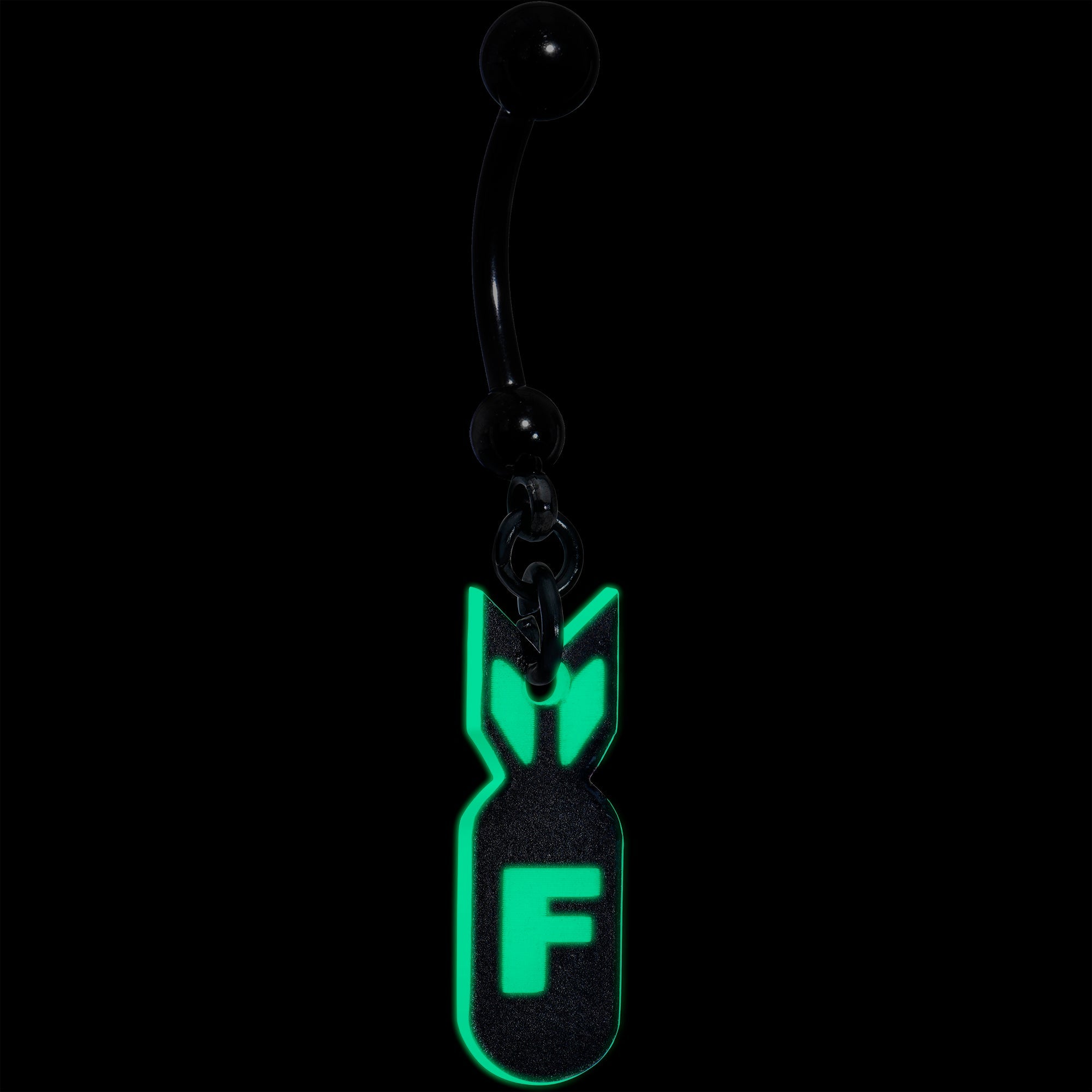 BodyCandy Black Glow in the Dark F Bomb Dangle Belly Ring — detail close-up