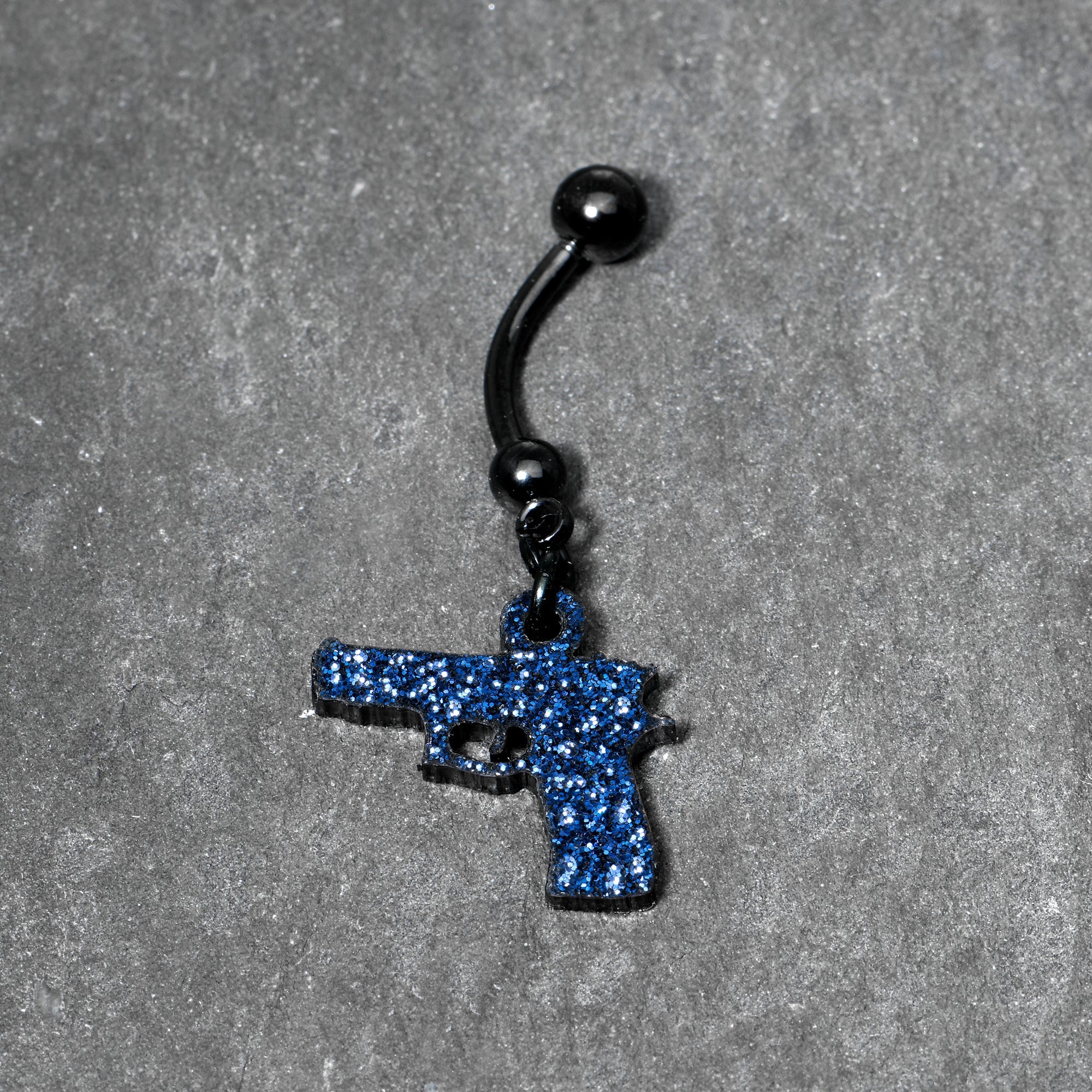 BodyCandy Blue Glitter Gun Dangle Belly Ring — lifestyle context