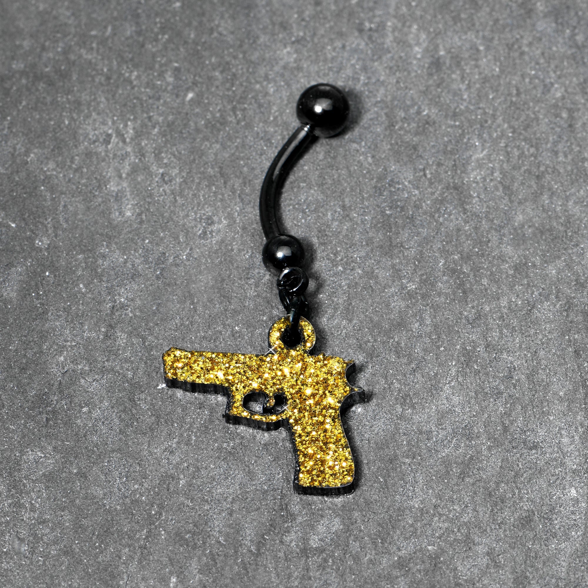 BodyCandy Yellow Glitter Gun Dangle Belly Ring — lifestyle context