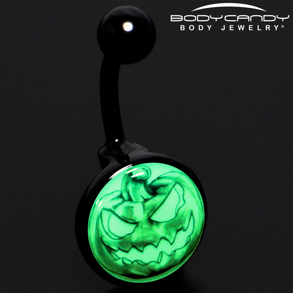 BodyCandy Black Titanium Bad Jack O' Lantern Glow in the Dark Belly Ring — detail close-up