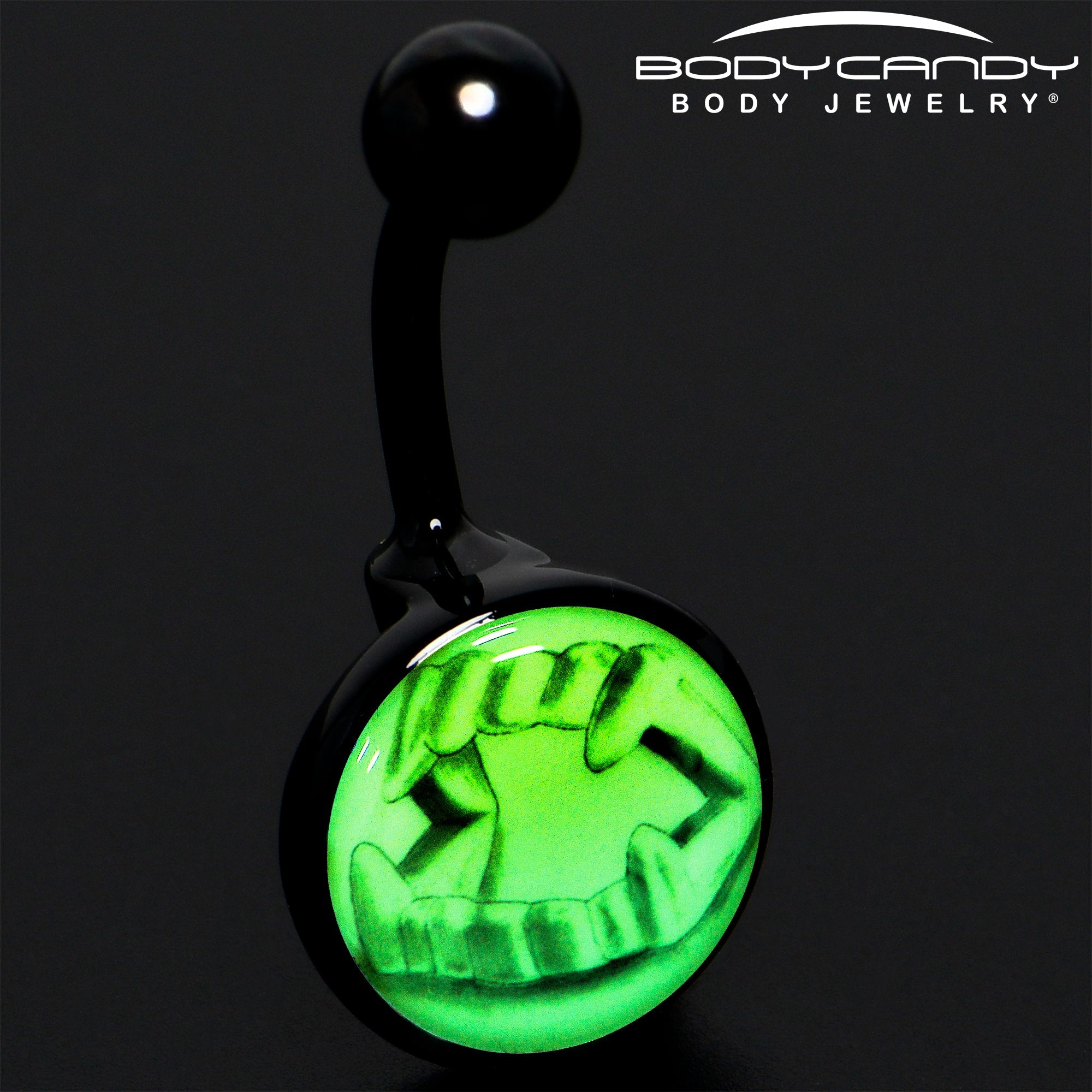 BodyCandy Black Titanium Fearsome Fangs Glow in the Dark Belly Ring — detail close-up