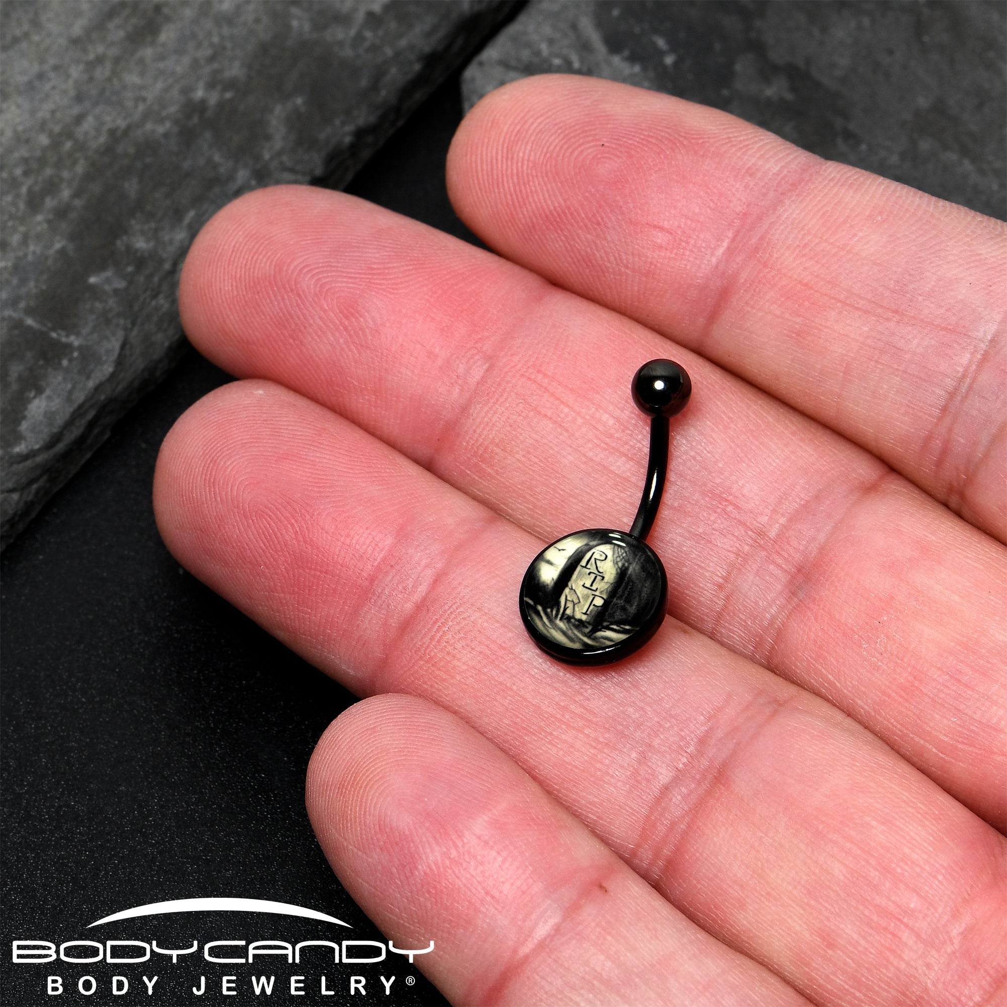 BodyCandy Black Titanium RIP Tombstone Glow in the Dark Belly Ring — back view