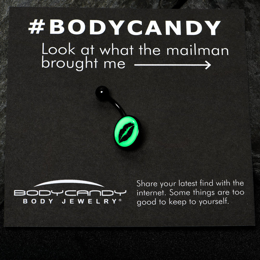 BodyCandy Black Glow in the Dark Lipstick Kiss Mark Belly Ring by Onyx O — in-use photo