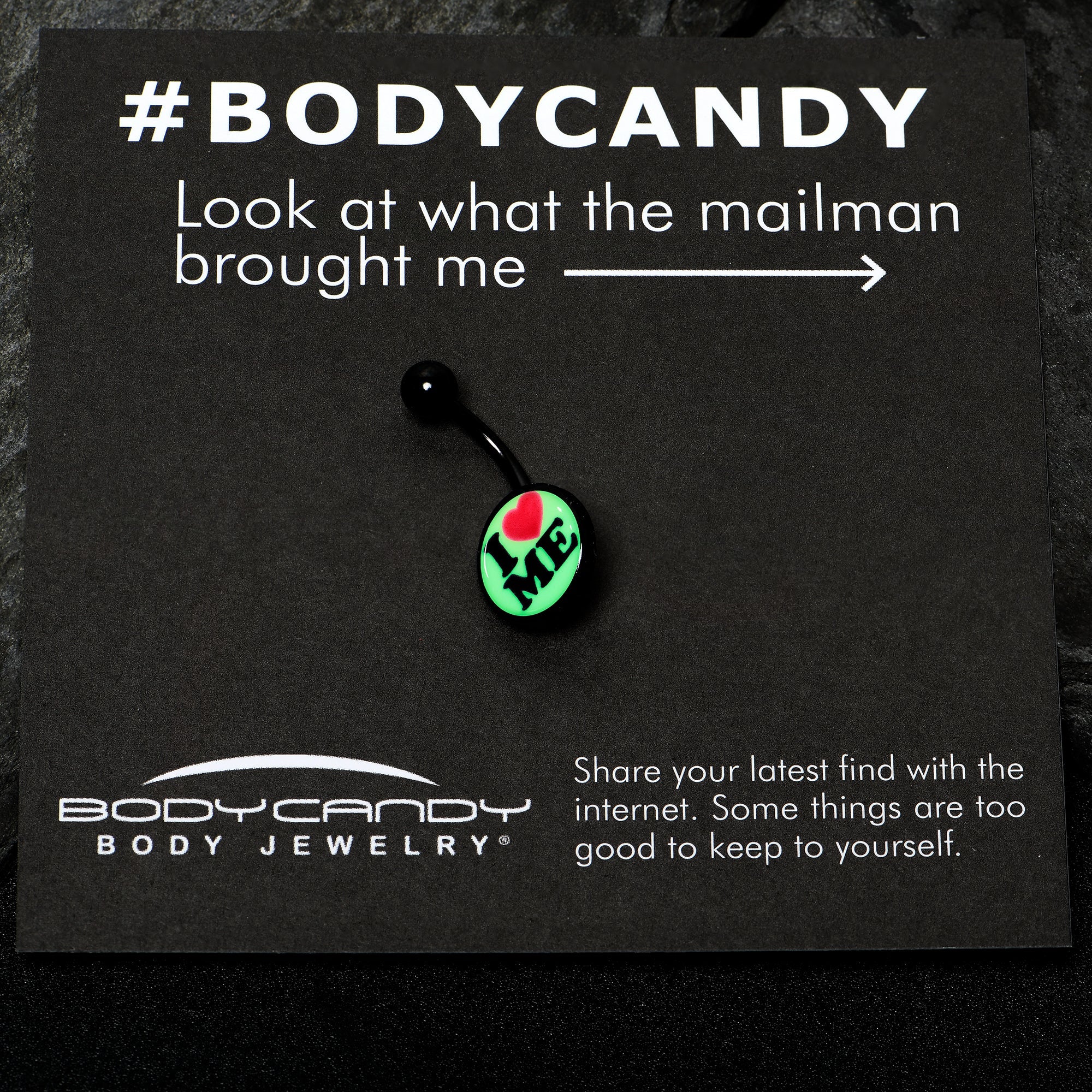 BodyCandy Black Glow in the Dark I Love Me Belly Ring by Onyx O — in-use photo