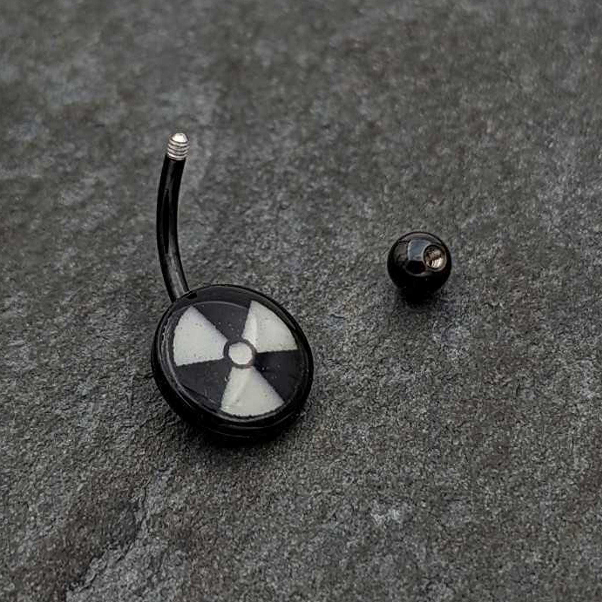 BodyCandy Black Glow in the Dark Radioactive Belly Ring by Onyx O — in-use photo