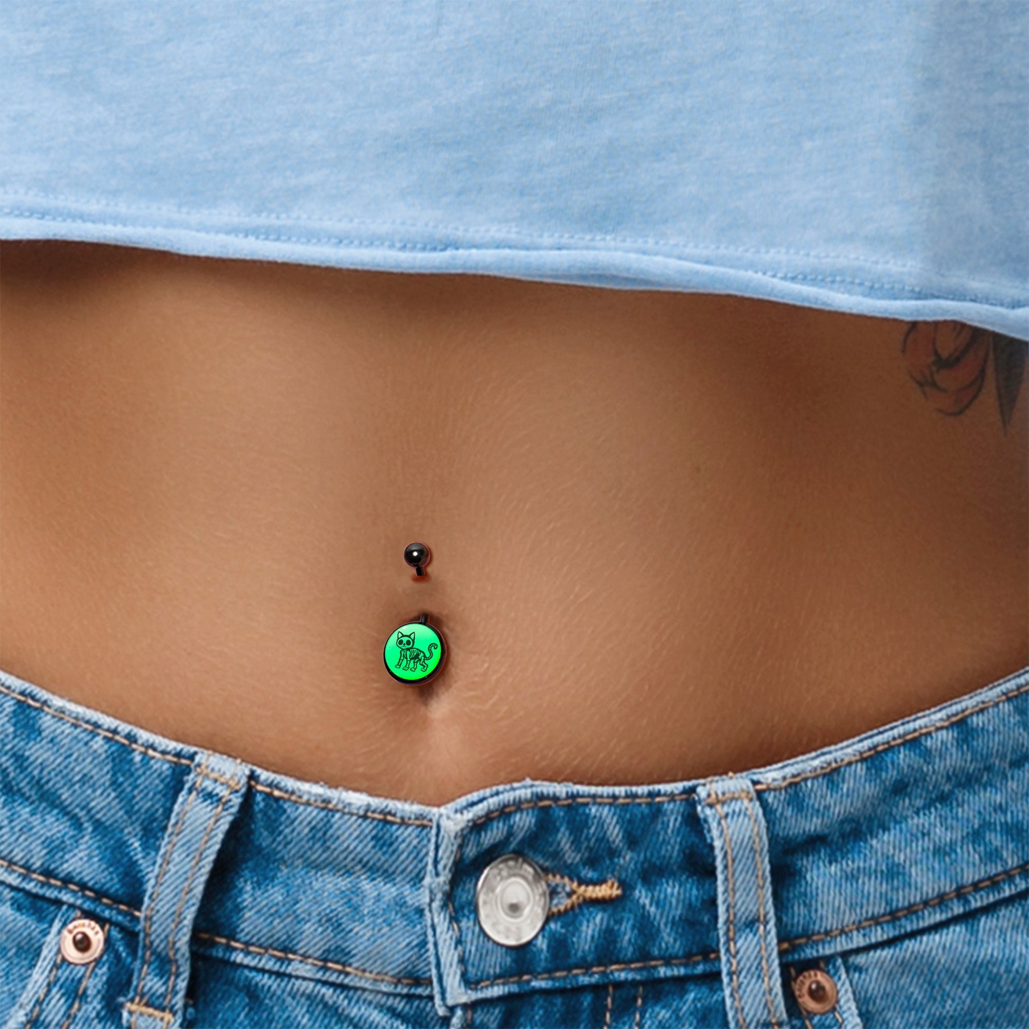 BodyCandy Black Anodized Glow in the Dark Skeleton Kitty Cat Belly Ring by Onyx O — in-use photo