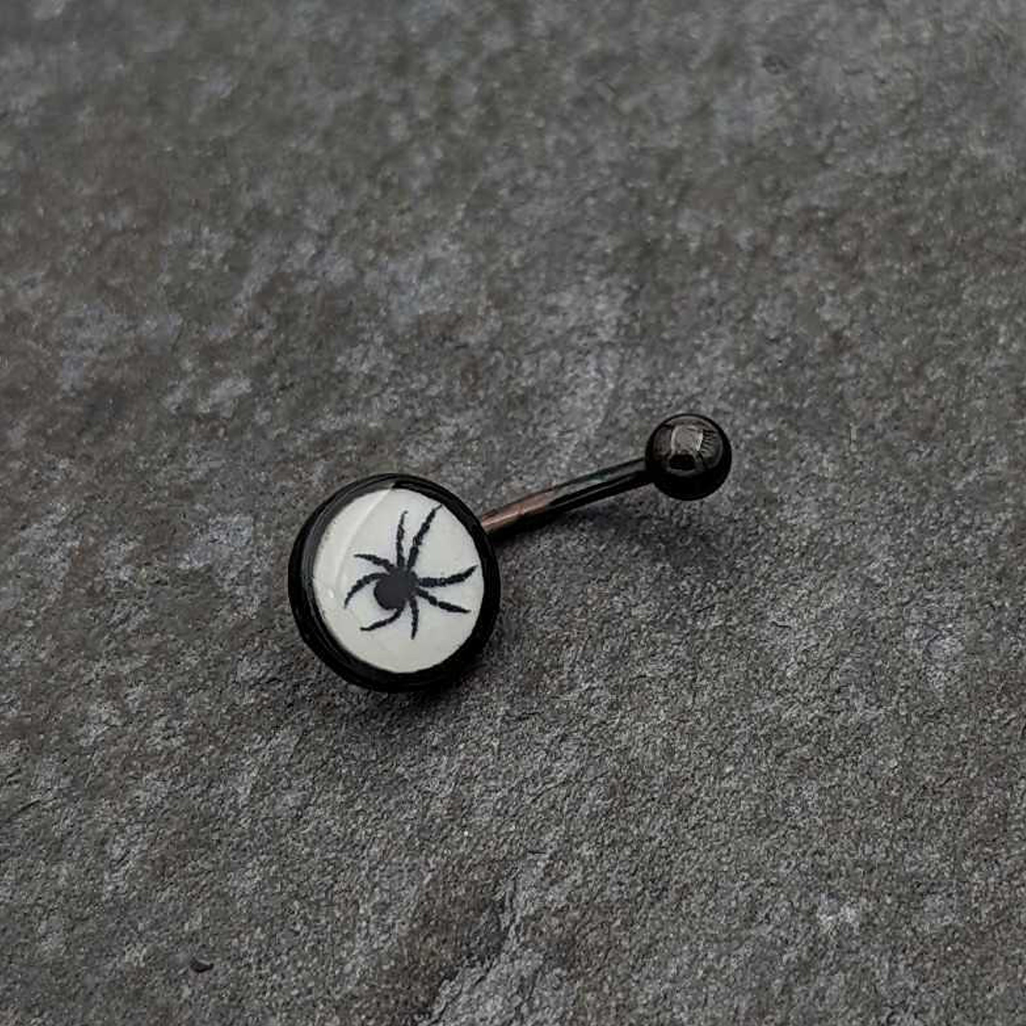 BodyCandy Black Glow in the Dark Black Widow Spider Belly Ring by Onyx O — in-use photo