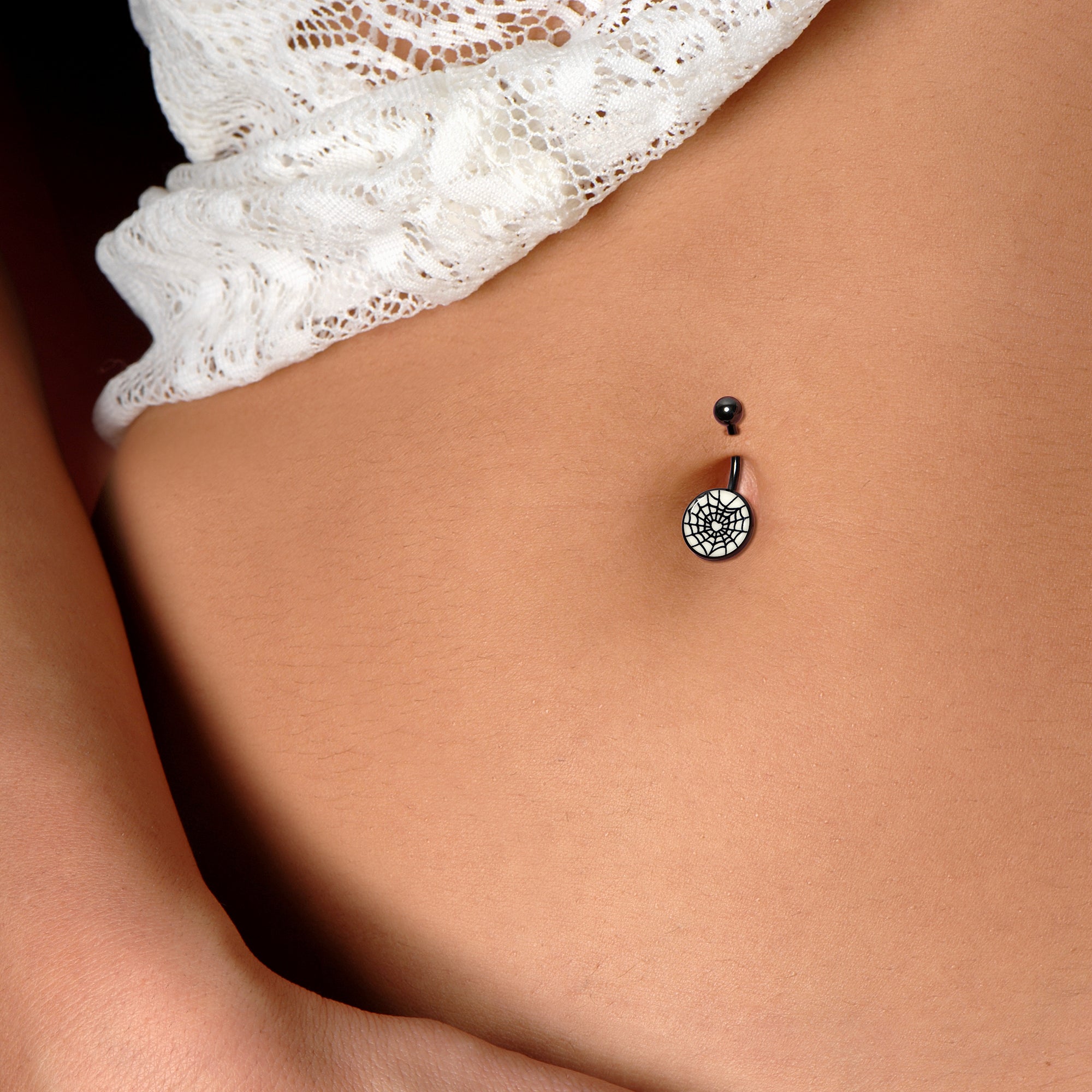 BodyCandy Black Glow in the Dark Heart Spider Web Belly Ring by Onyx O — detail close-up