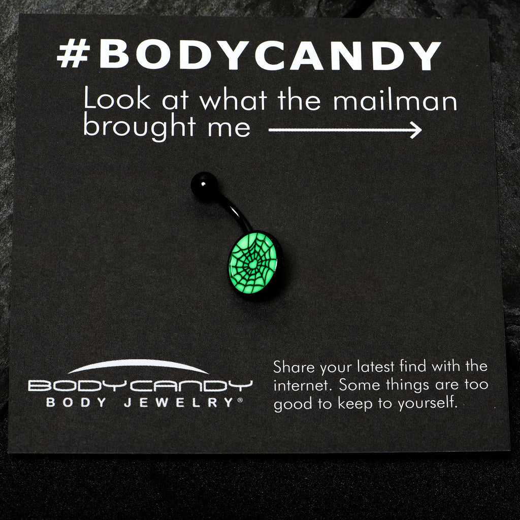 BodyCandy Black Glow in the Dark Heart Spider Web Belly Ring by Onyx O — in-use photo