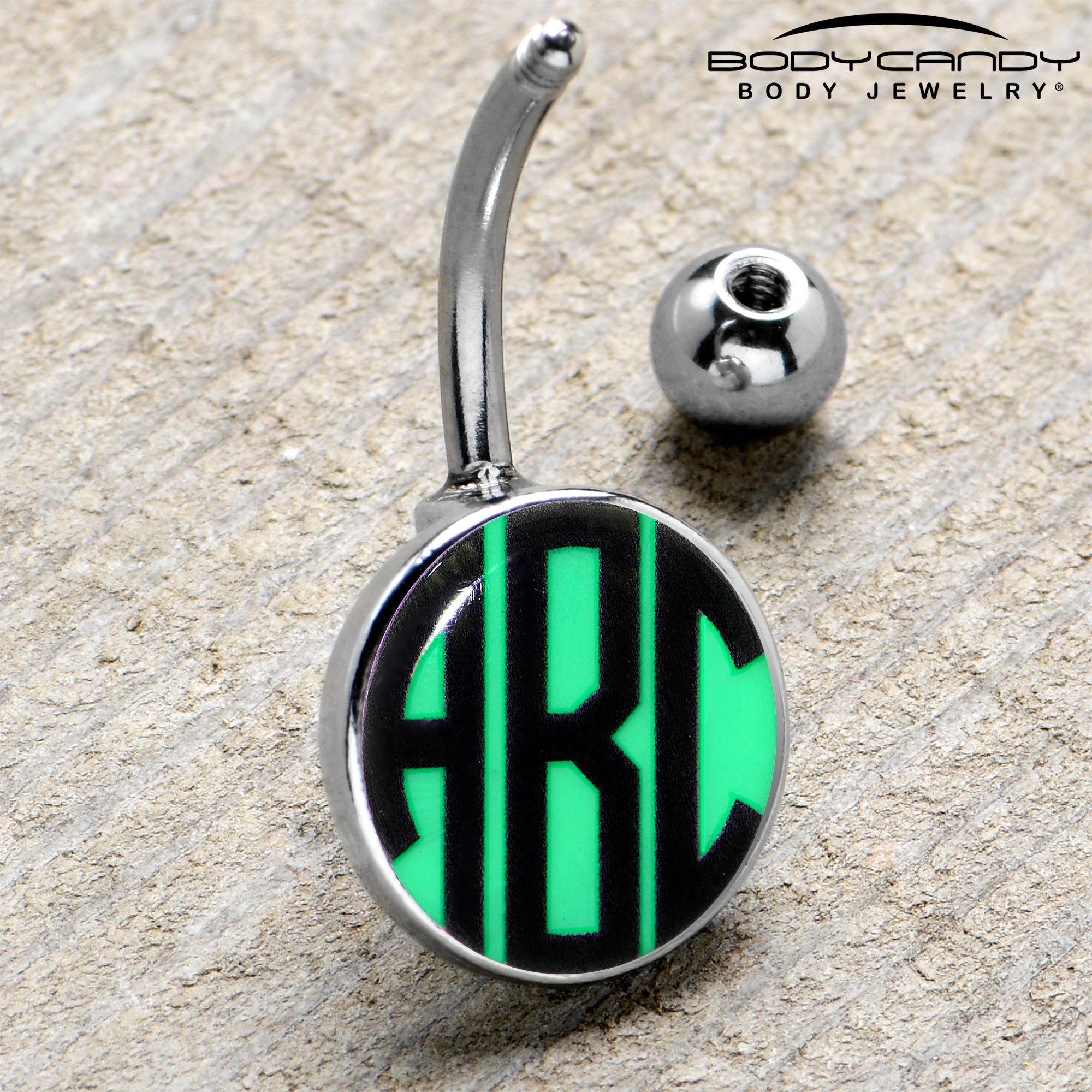 BodyCandy Custom Glow in the Dark Logo Personalized Initial Belly Ring — feature highlight