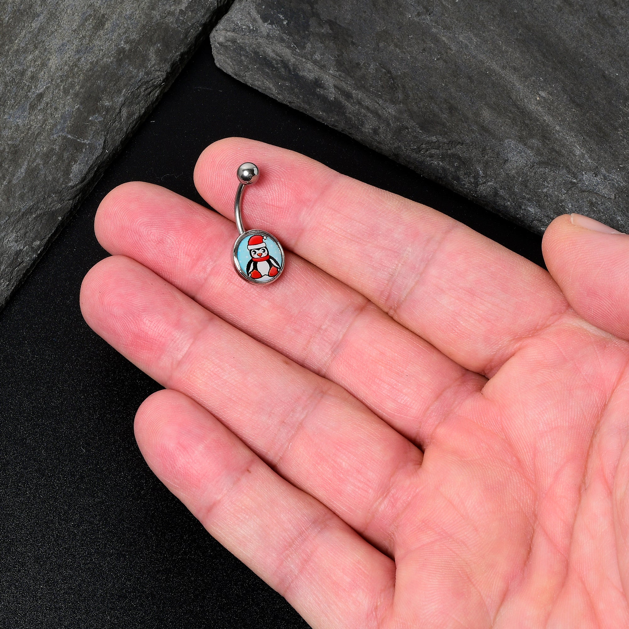 BodyCandy Snowfall Holiday Penguin Belly Ring by Onyx O — in-use photo