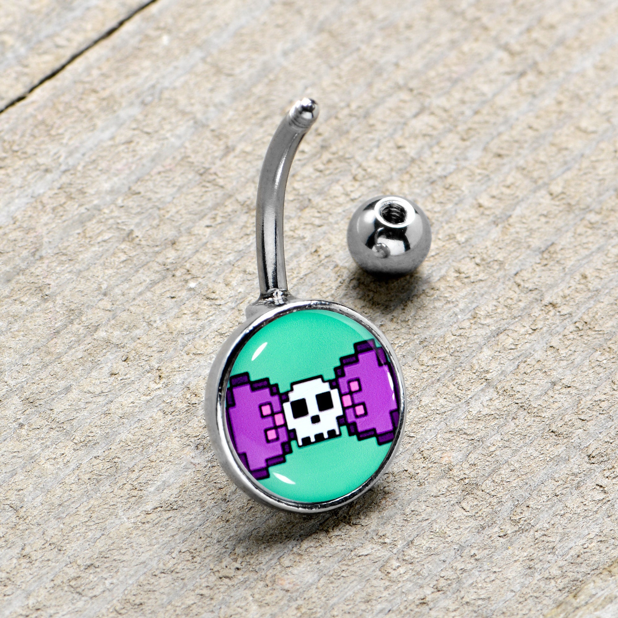 BodyCandy Retro Pixel Skull Belly Ring by Onyx O — lifestyle context
