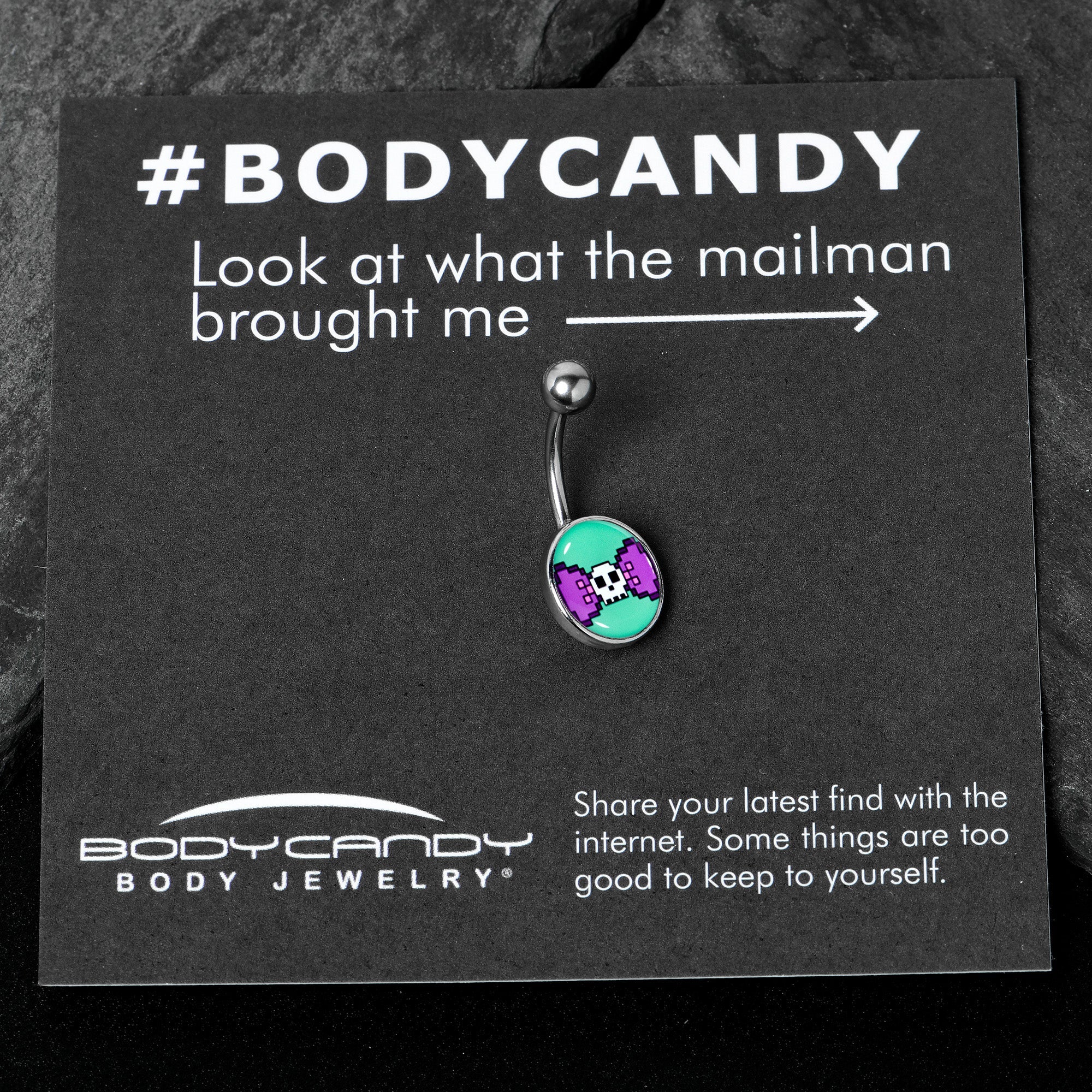 BodyCandy Retro Pixel Skull Belly Ring by Onyx O — in-use photo