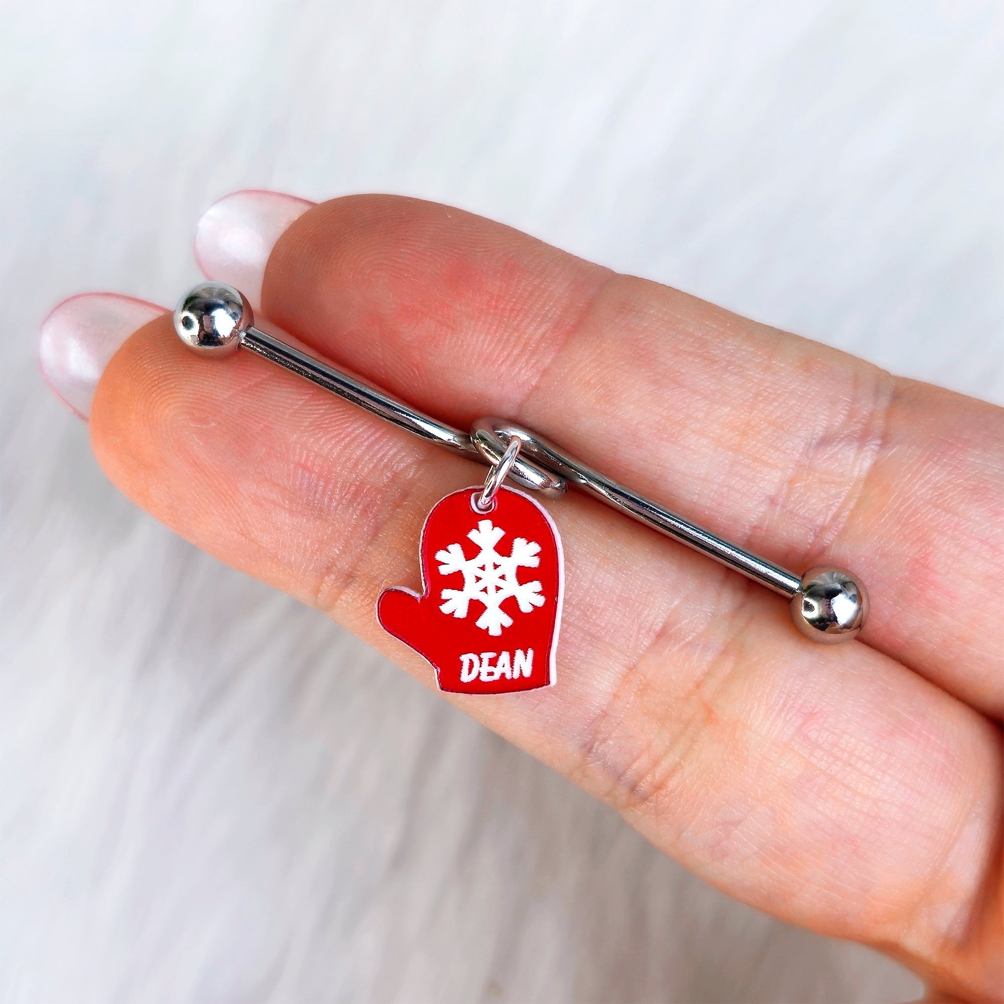 BodyCandy Custom Holiday Mitten Personalized Industrial Barbell — detail close-up