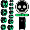 BodyCandy 0G Glow in the Dark Simple Skull Black Acrylic Saddle Plug Set by Onyx O — main product shot