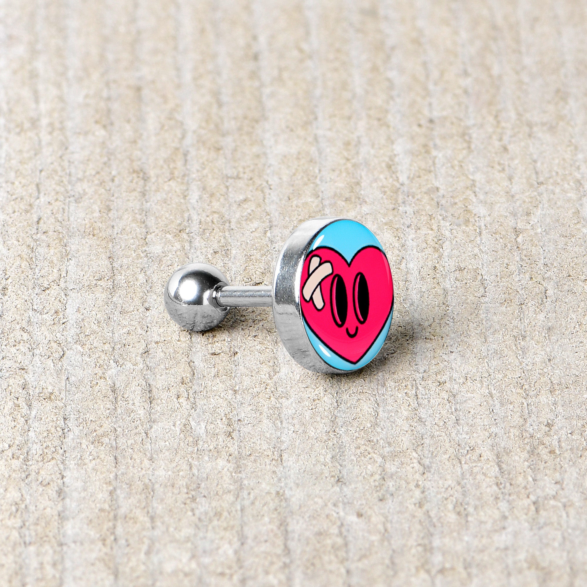 BodyCandy 16G 1/4 Heartbreak Bandaged Heart Cartilage Tragus Earring by Onyx O — back view