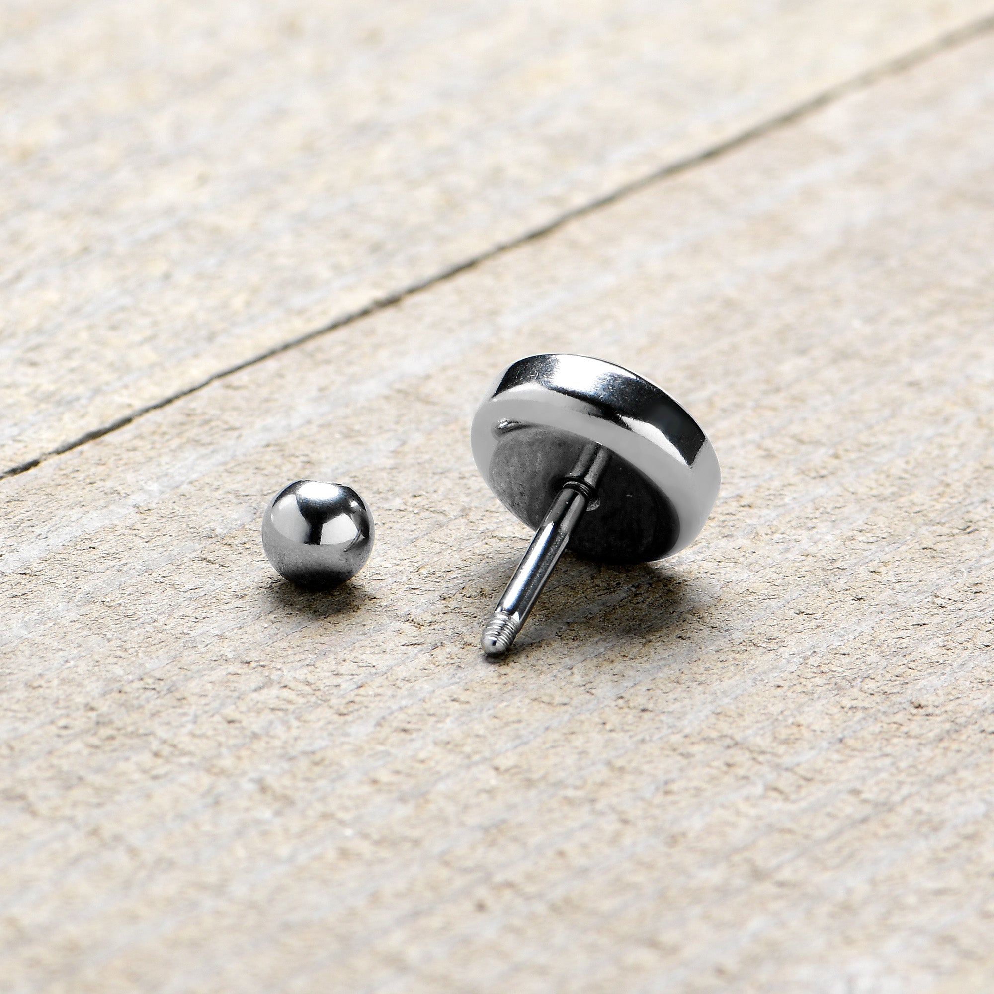 BodyCandy 16G 1/4 Heartbreak Bandaged Heart Cartilage Tragus Earring by Onyx O — alternative angle