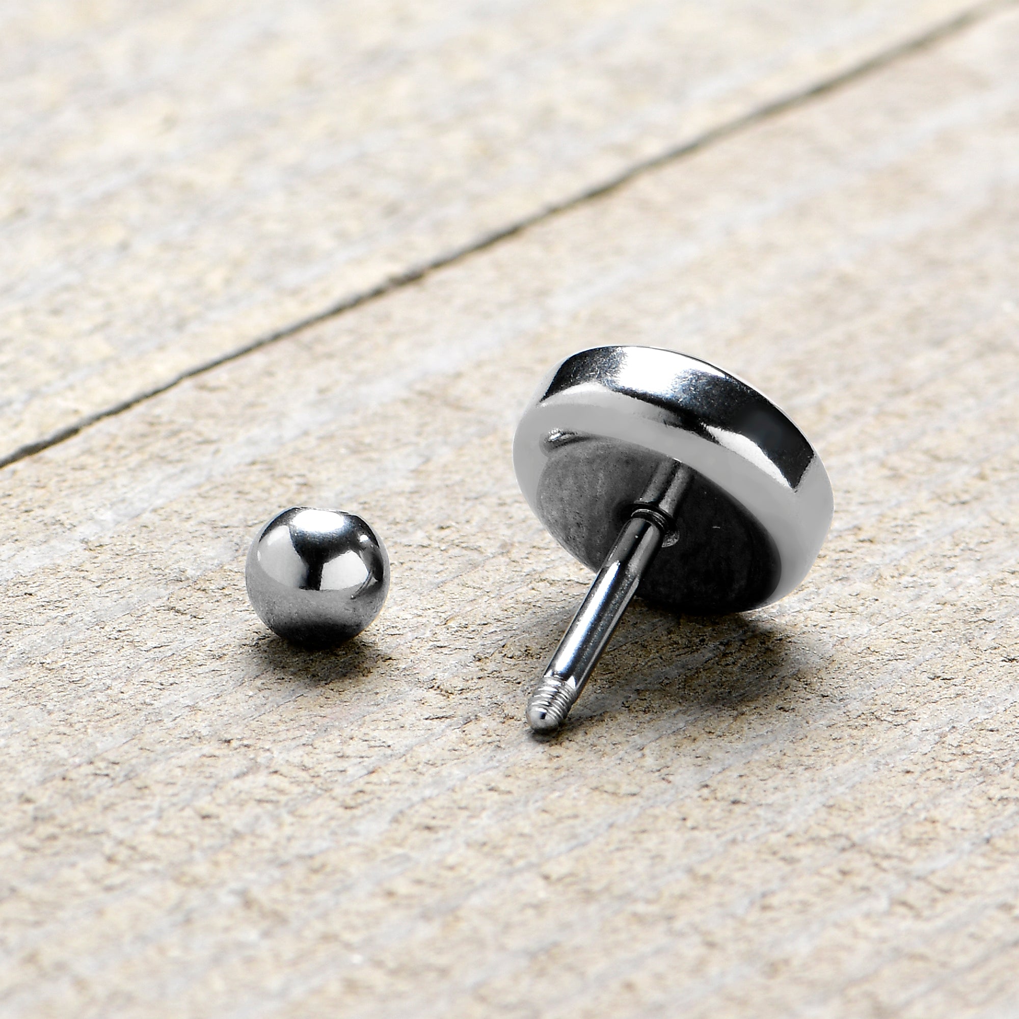 BodyCandy 16G 1/4 Polka Dot Mushroom Hat Cat Cartilage Tragus Earring by Onyx O — size reference