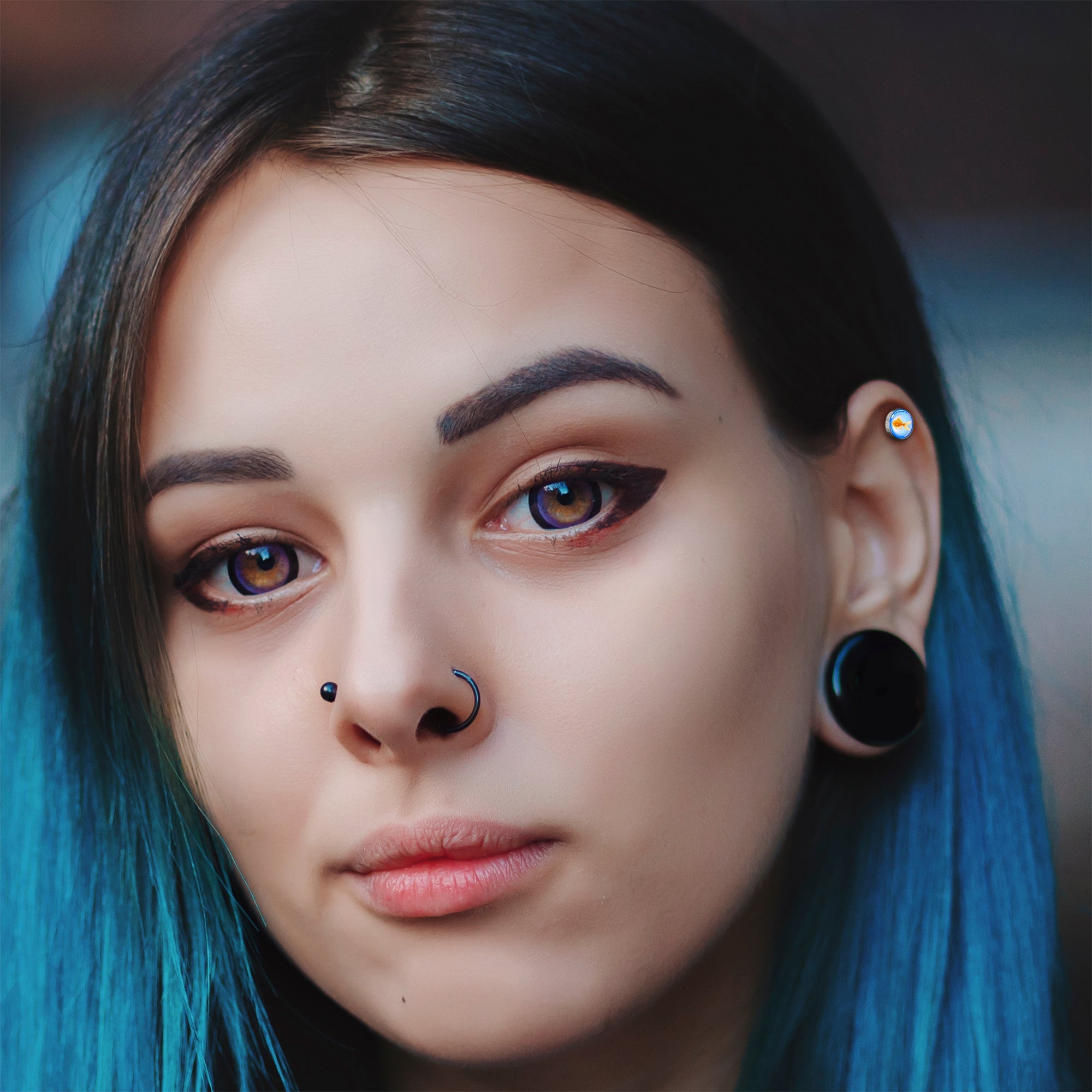 BodyCandy 16G 1/4 Gold Fish Cartilage Tragus Earring by Onyx O — lifestyle context