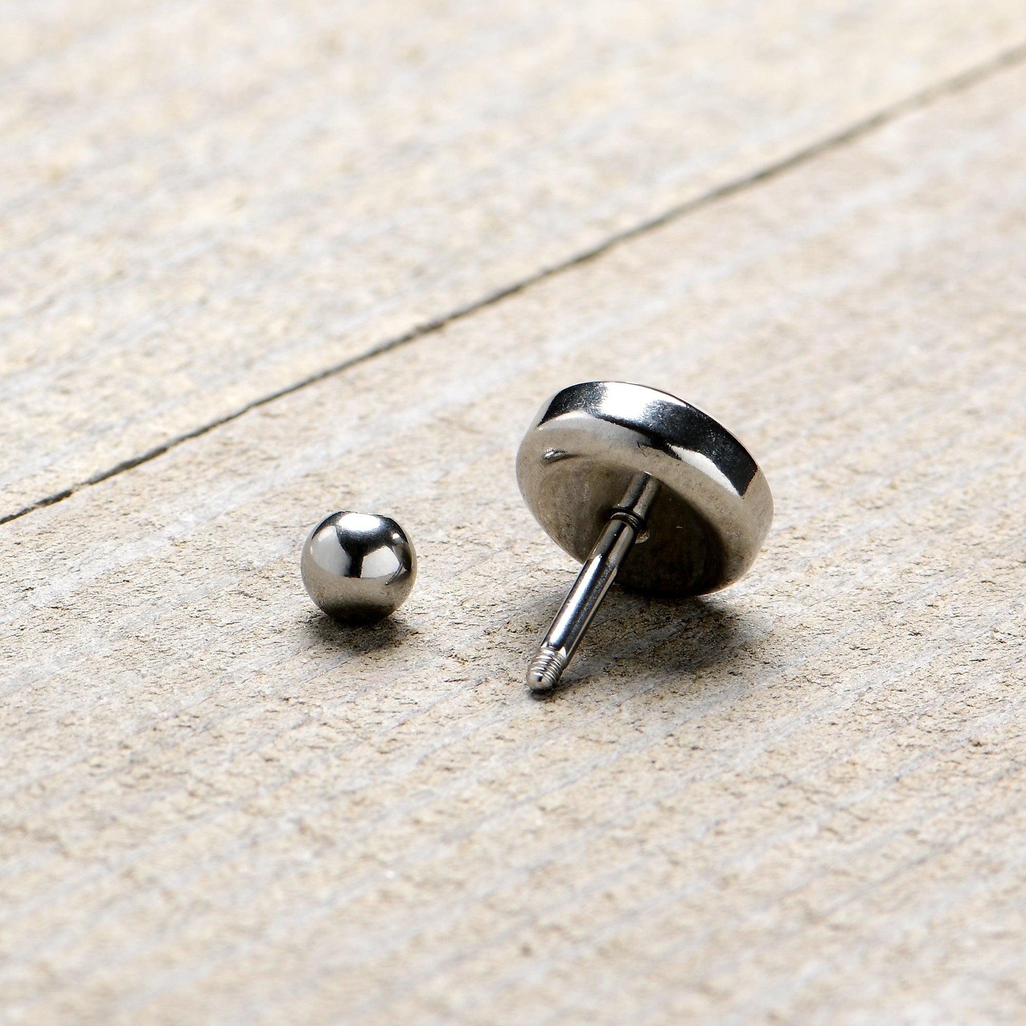 BodyCandy 16G 1/4 Snowfall Holiday Penguin Tragus Cartilage Earring by Onyx O — back view