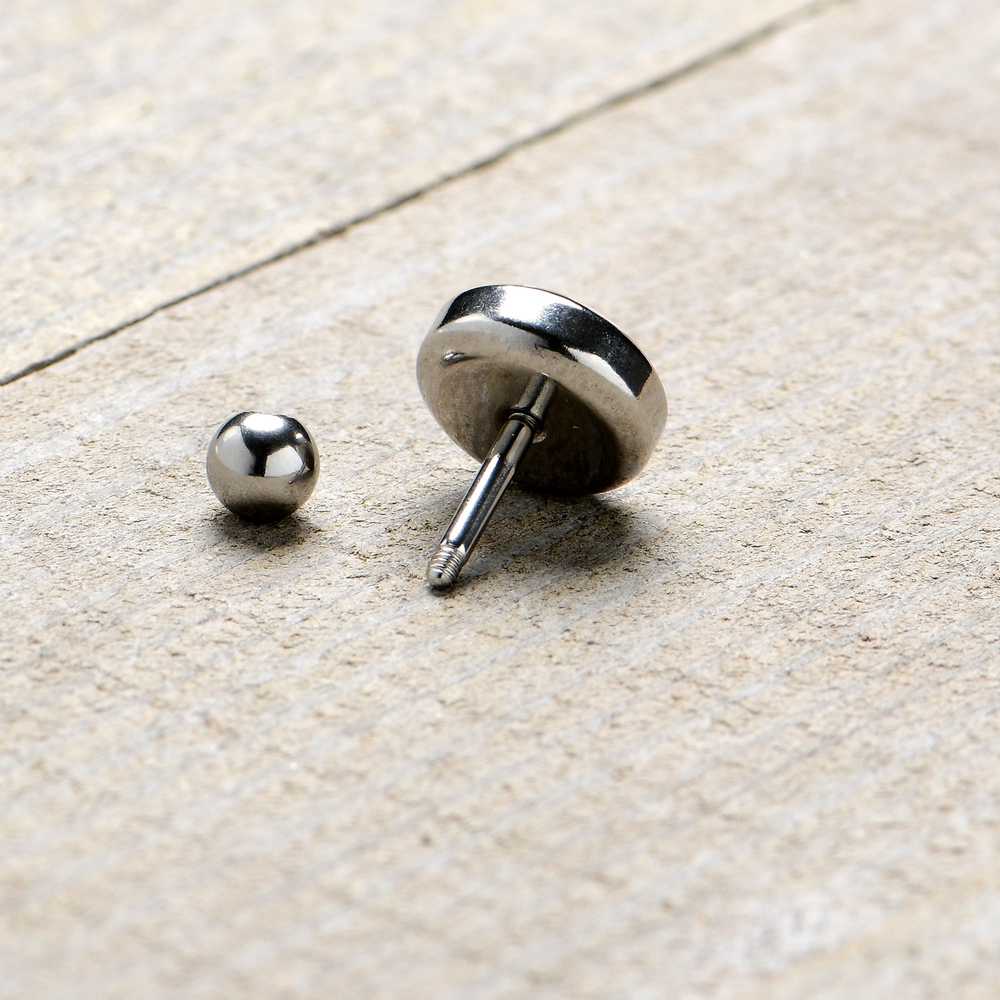 BodyCandy 16G 1/4 Christmas Peace Love Santa Tragus Cartilage Earring by Onyx O — back view