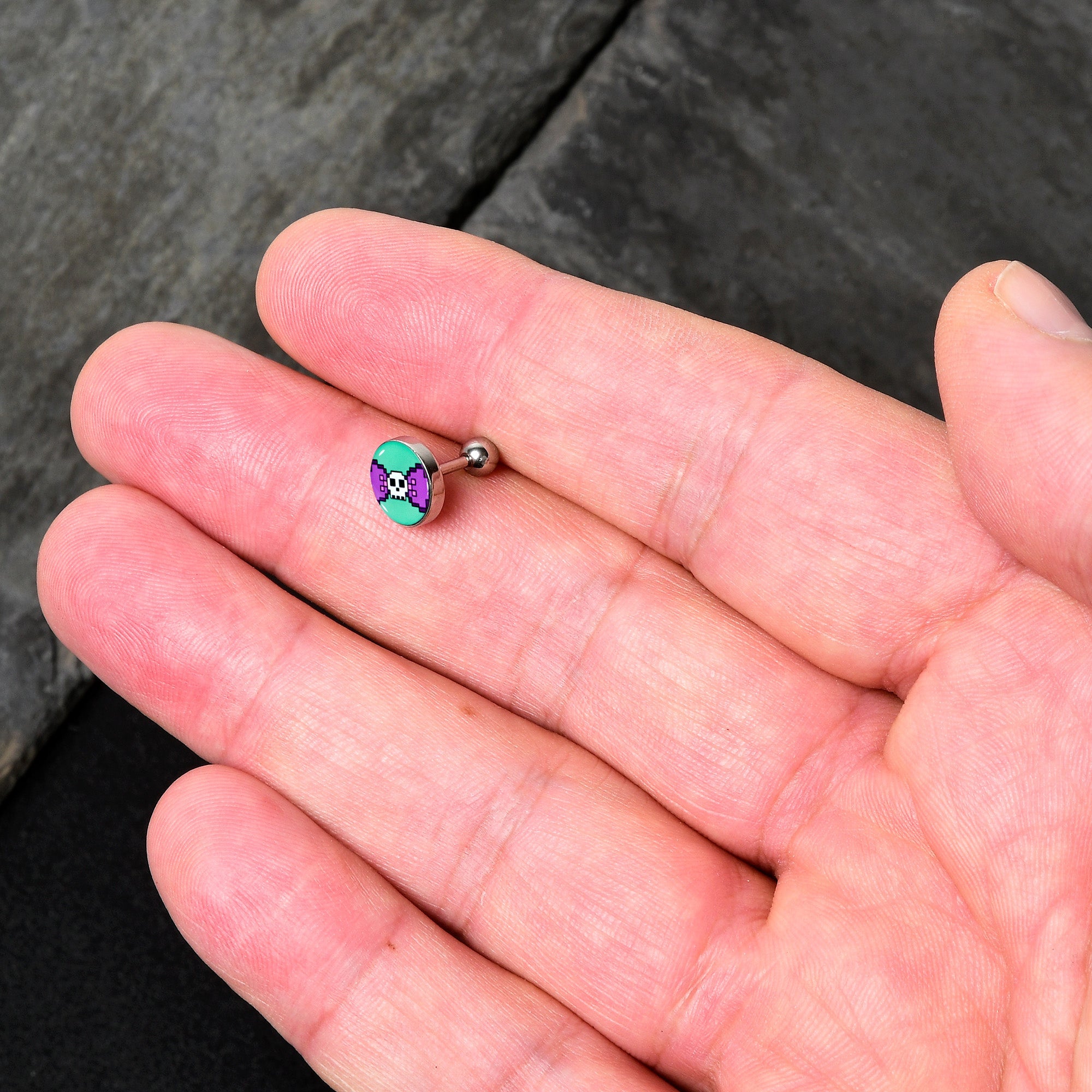 BodyCandy 16G 1/4 Retro Pixel Skull Cartilage Tragus Earring by Onyx O — lifestyle context