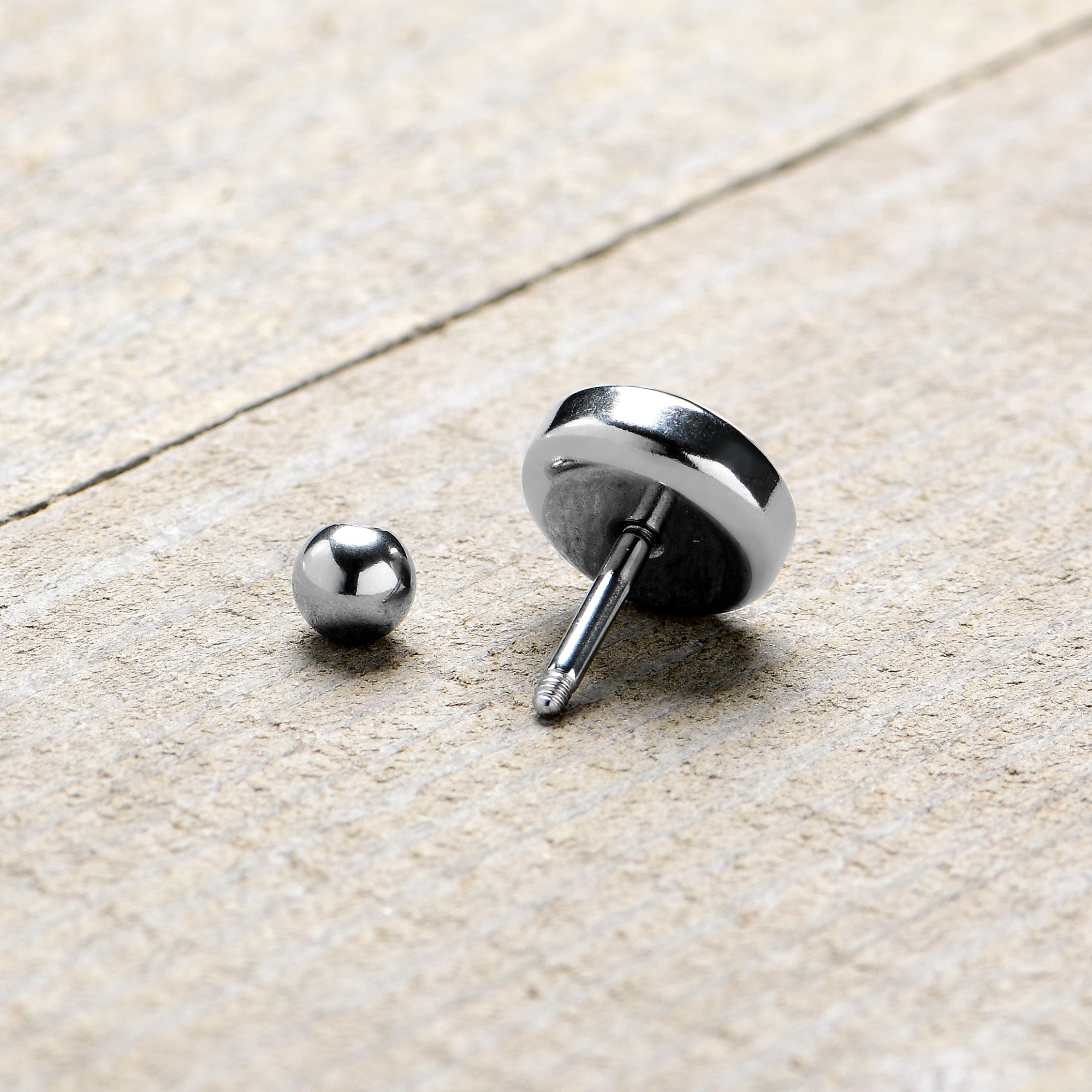 BodyCandy 16G 1/4 Retro Pixel Skull Cartilage Tragus Earring by Onyx O — alternative angle