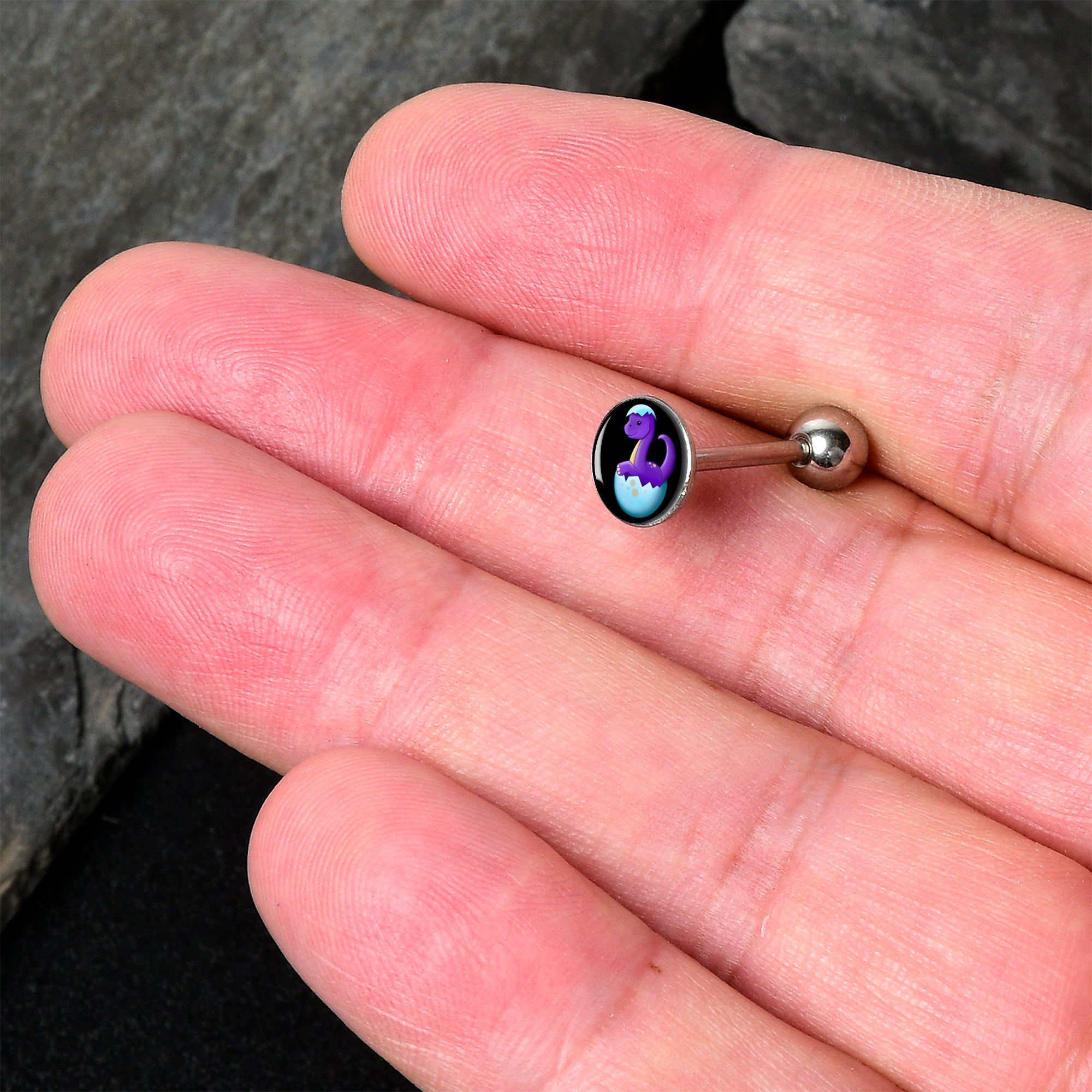 BodyCandy Baby Dinosaur Barbell Tongue Ring by Onyx O — detail close-up