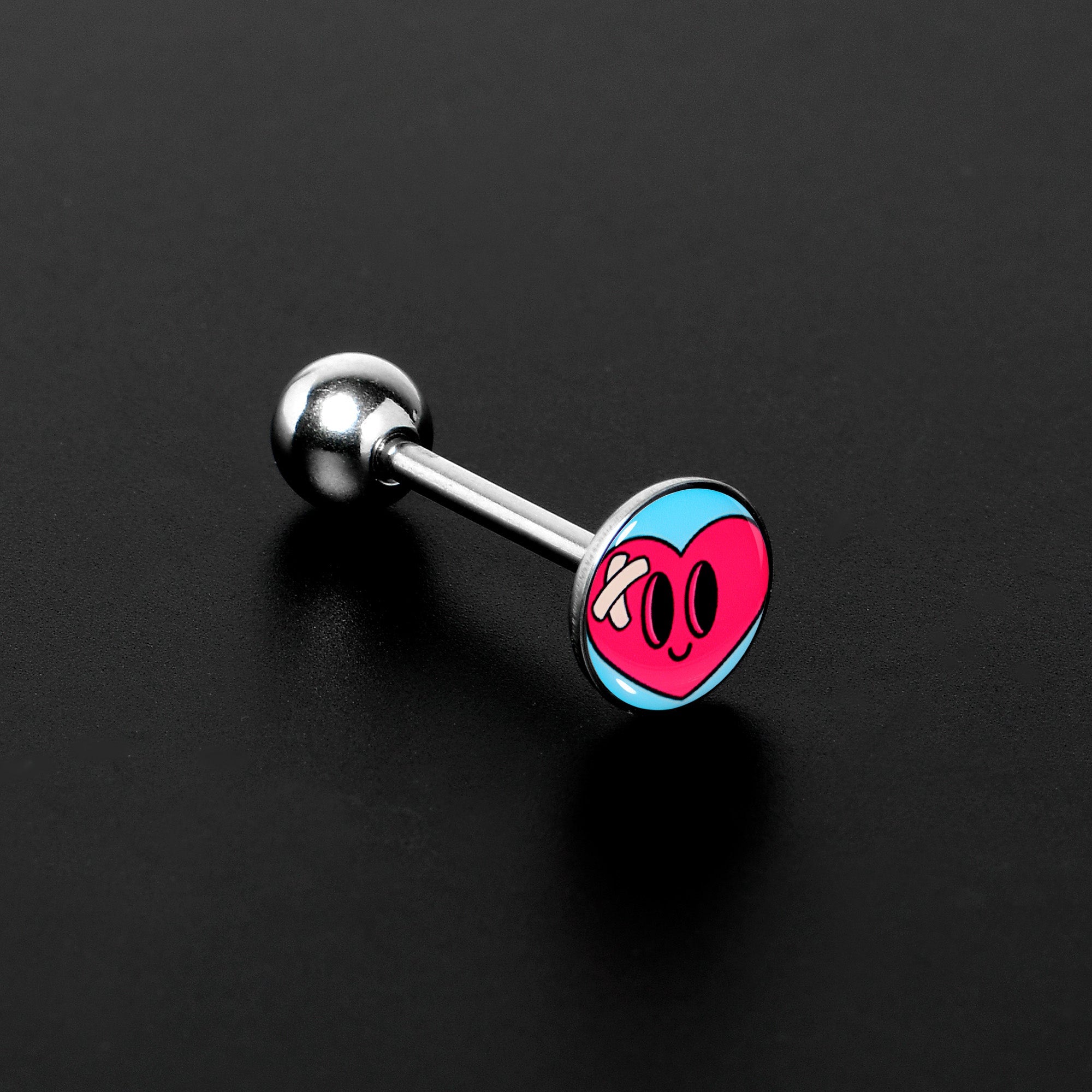 BodyCandy Heartbreak Bandaged Heart Barbell Tongue Ring by Onyx O — detail close-up