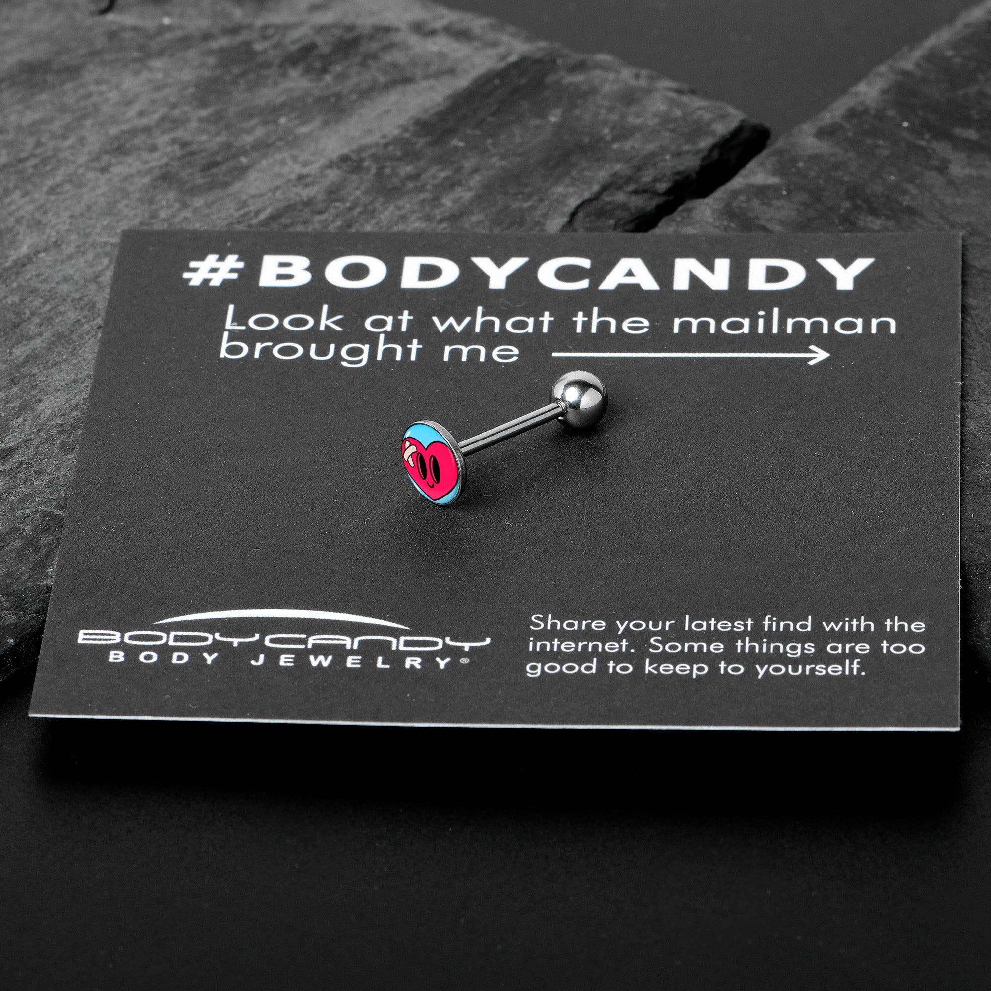 BodyCandy Heartbreak Bandaged Heart Barbell Tongue Ring by Onyx O — in-use photo