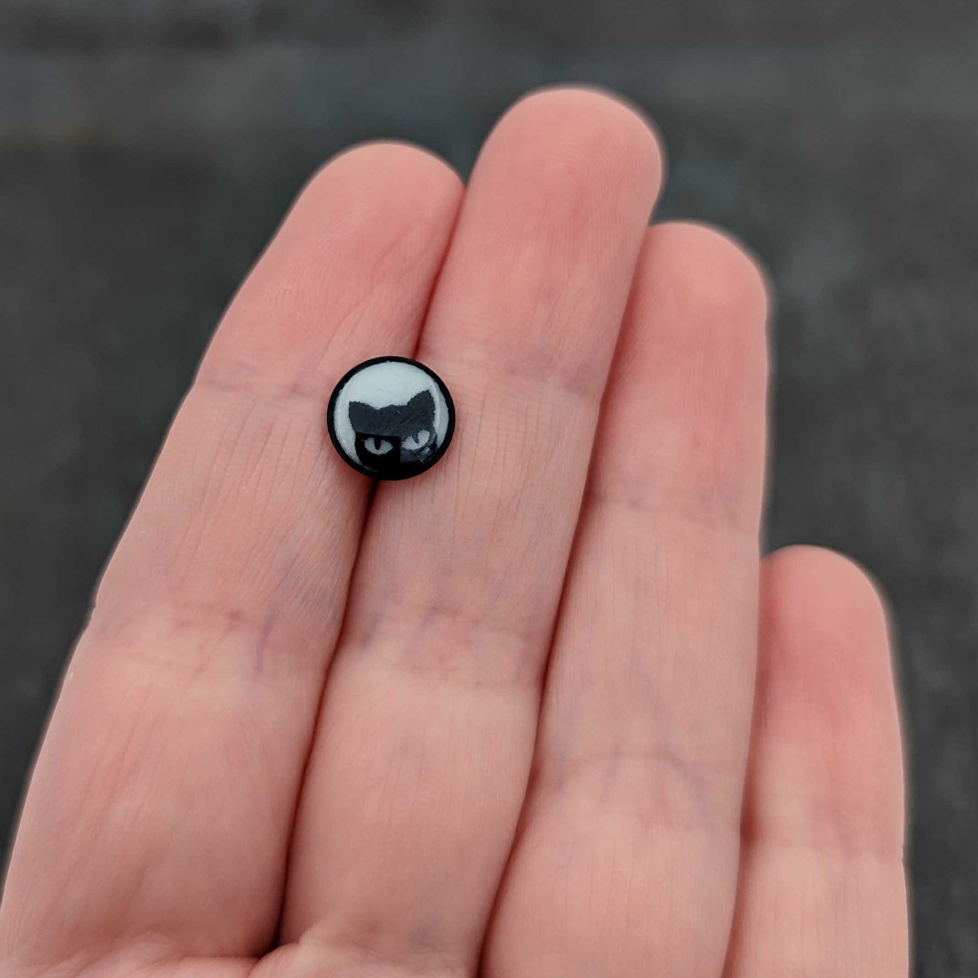 BodyCandy Glow in the Dark Black Anodized Peeking Black Cat Barbell Tongue Ring by Onyx O — in-use photo
