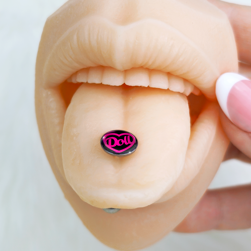 BodyCandy Hollow Heart Doll Word Barbell Tongue Ring by Onyx O — detail close-up
