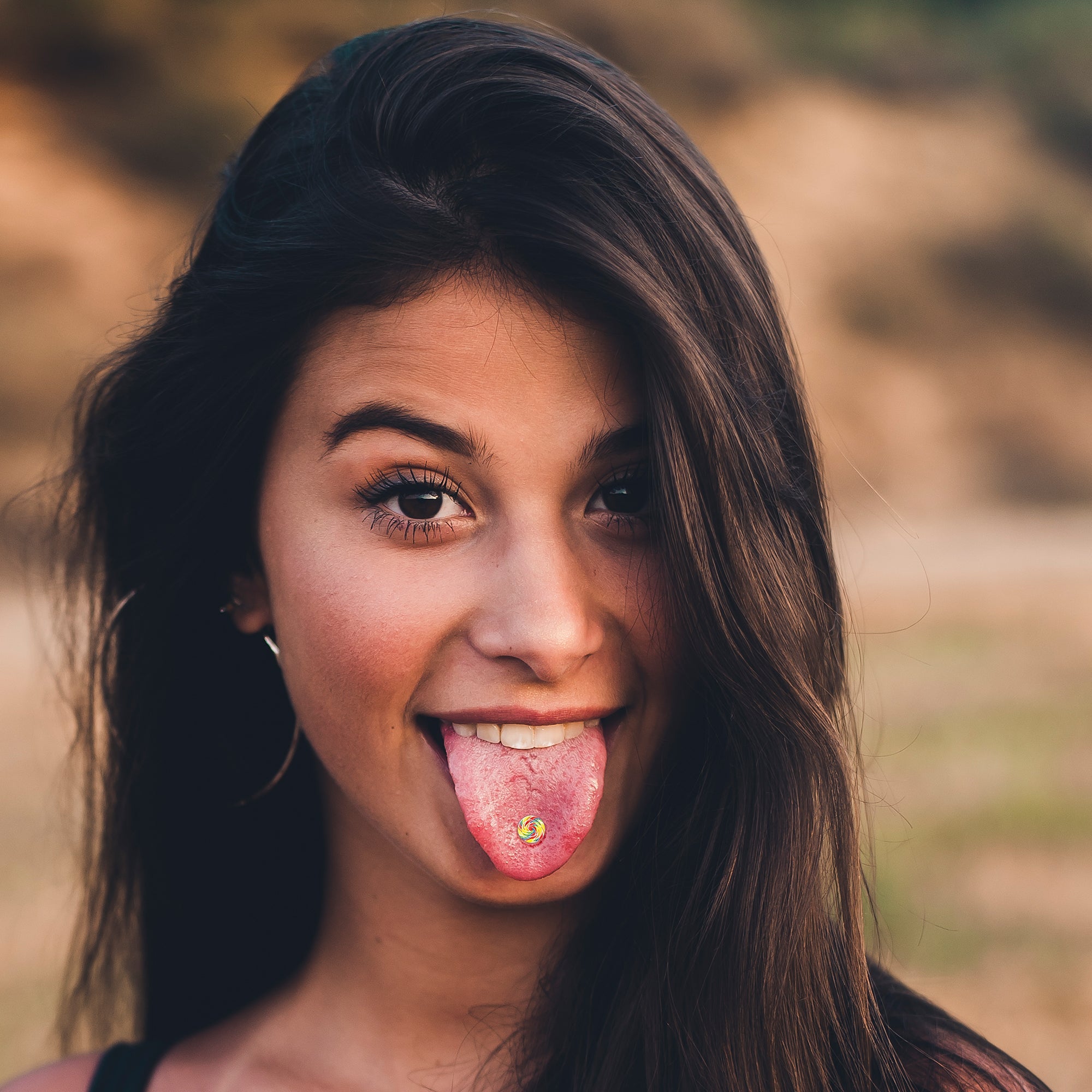 BodyCandy Rainbow Swirl Lollipop Barbell Tongue Ring by Onyx O — lifestyle context