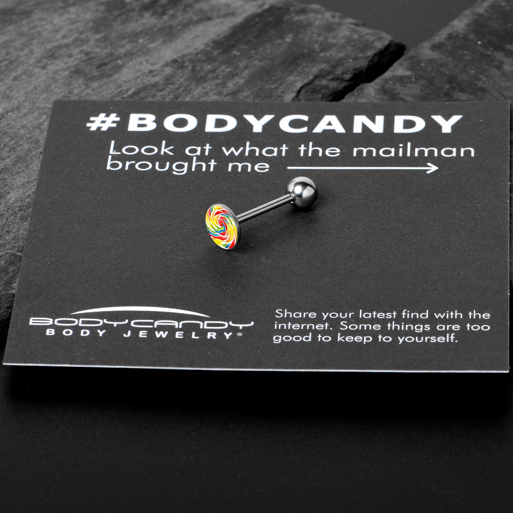 BodyCandy Rainbow Swirl Lollipop Barbell Tongue Ring by Onyx O — in-use photo