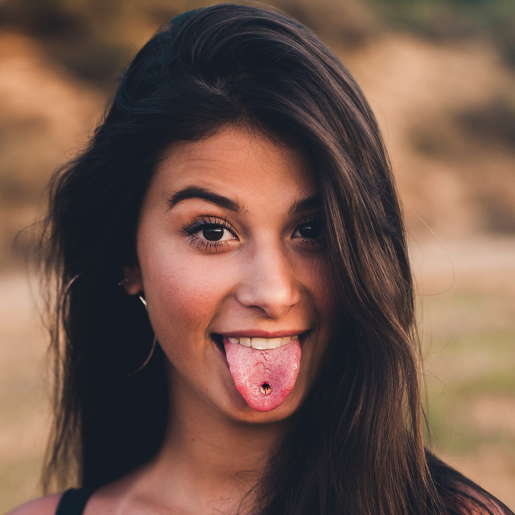 BodyCandy Red Sunset Palm Tree Barbell Tongue Ring by Onyx O — lifestyle context