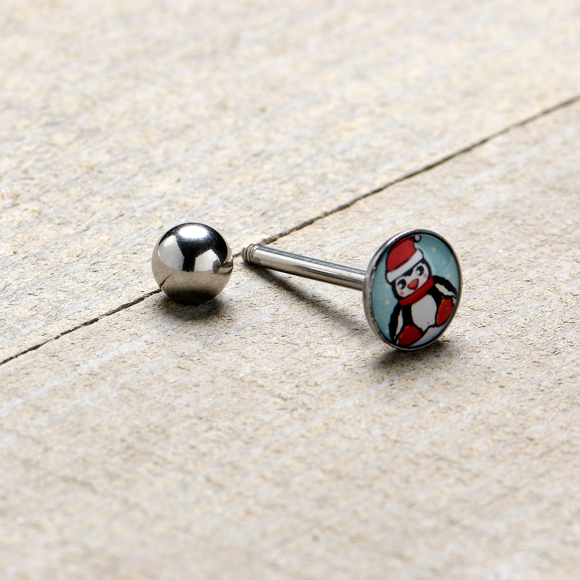 BodyCandy Snowfall Holiday Penguin Barbell Tongue Ring by Onyx O — back view
