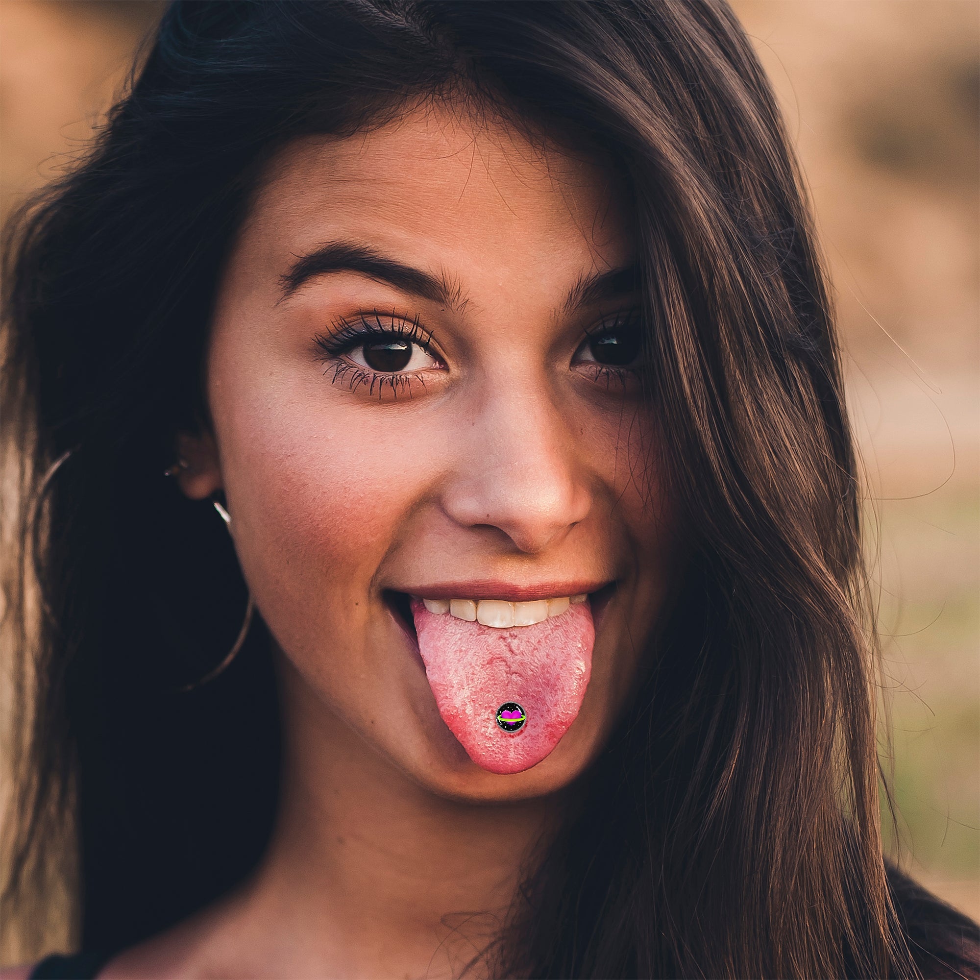 BodyCandy Heart Planet Barbell Tongue Ring by Onyx O — lifestyle context