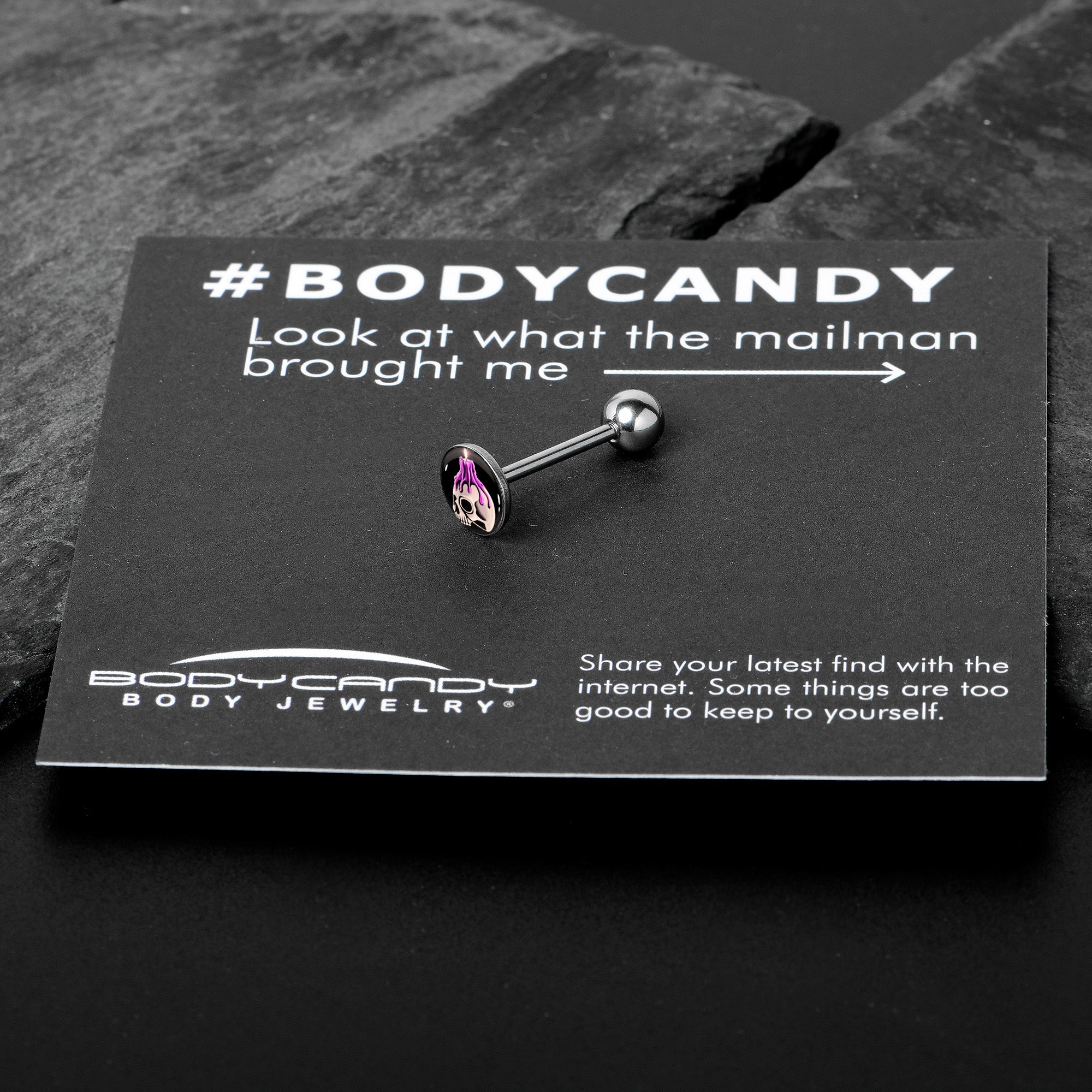 BodyCandy Burning Skull Candle Barbell Tongue Ring by Onyx O — in-use photo