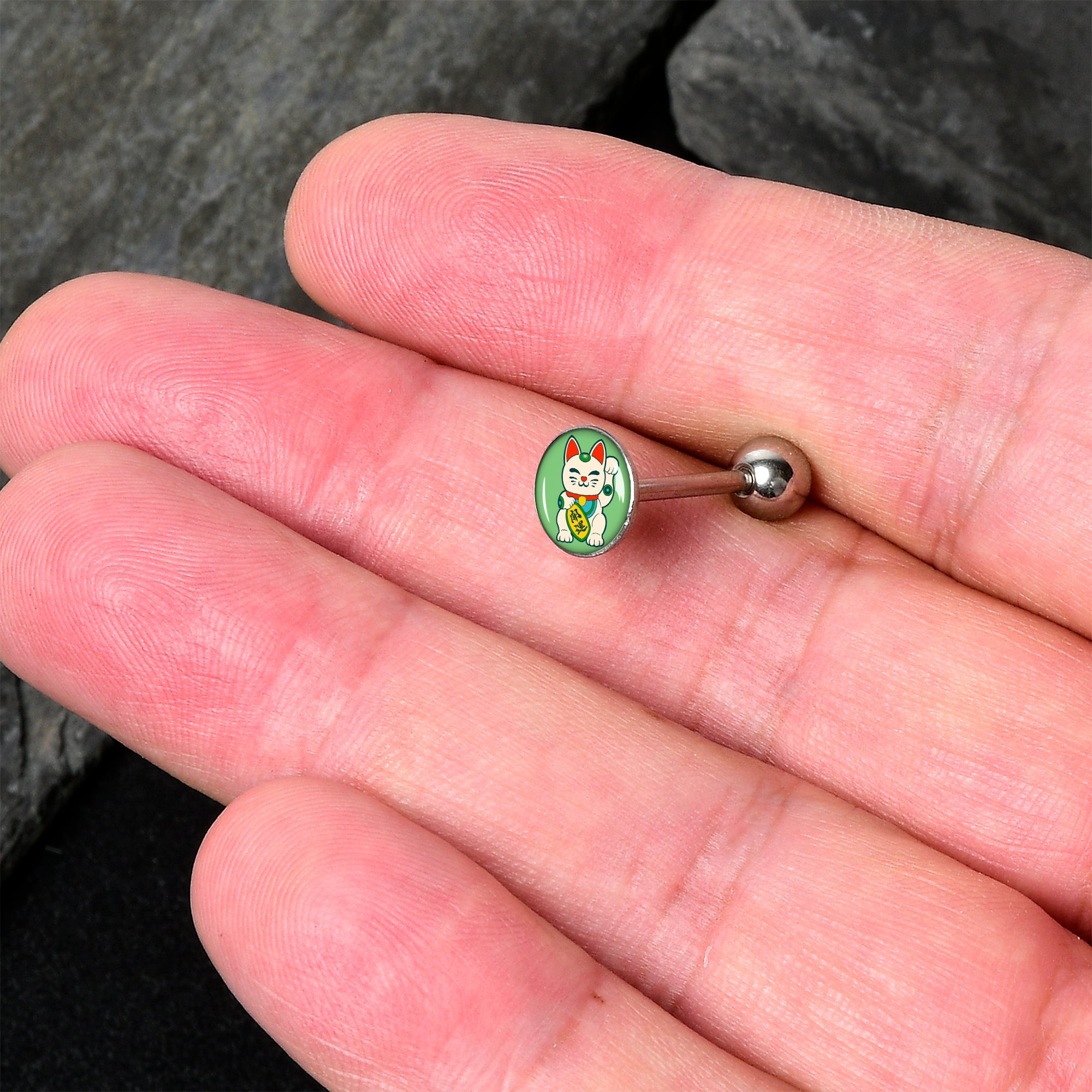 BodyCandy Waving Cat Barbell Tongue Ring by Onyx O — detail close-up