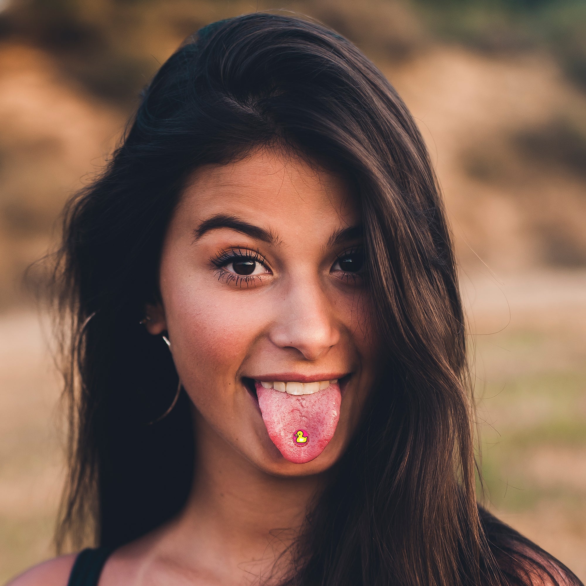BodyCandy Yellow Ducky Barbell Tongue Ring by Onyx O — side view