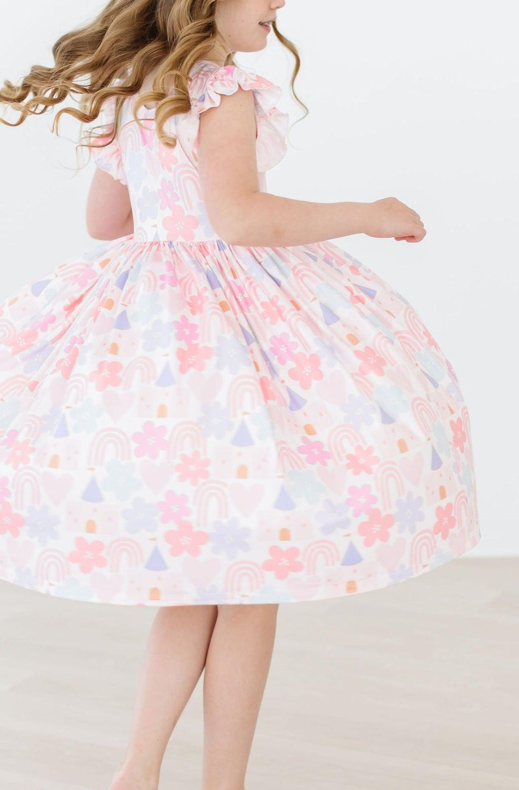 Mila & Rose ® Castles & Rainbows Flutter Sleeve Twirl Dress — lifestyle context