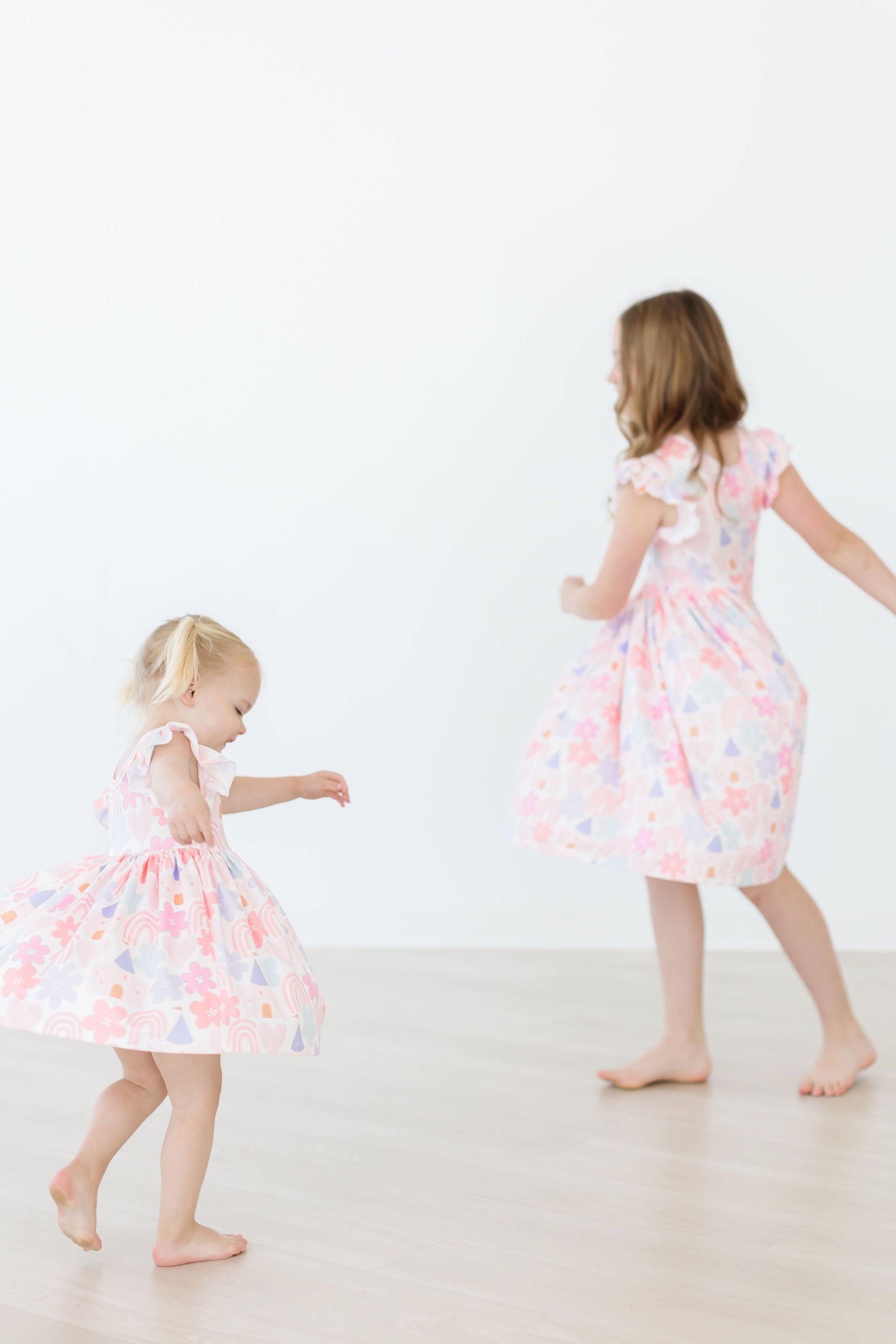 Mila & Rose ® Castles & Rainbows Flutter Sleeve Twirl Dress — side view