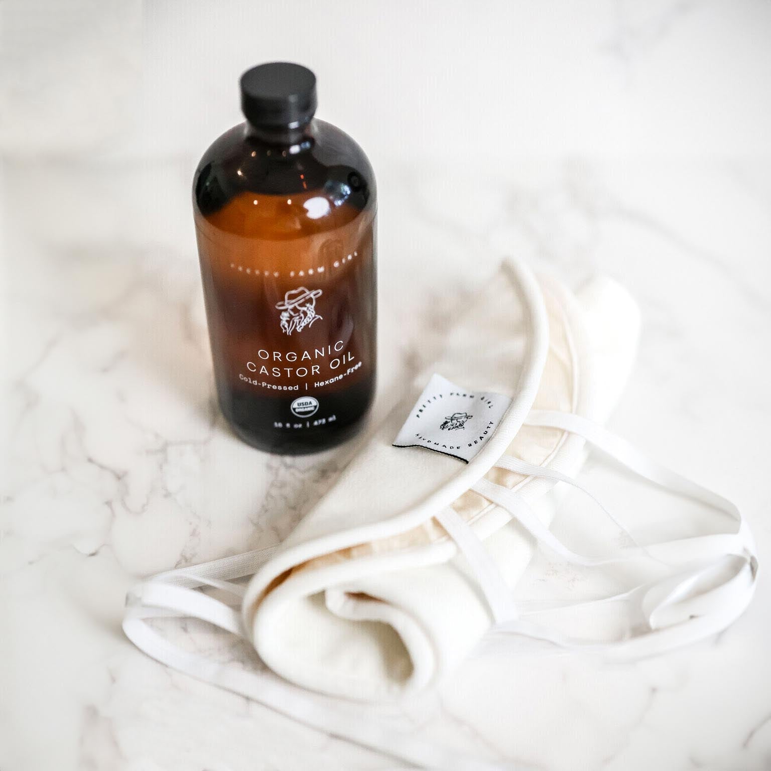Pretty farm girl Organic Pure Castor Oil + Cloth Pack Bundle — lifestyle context